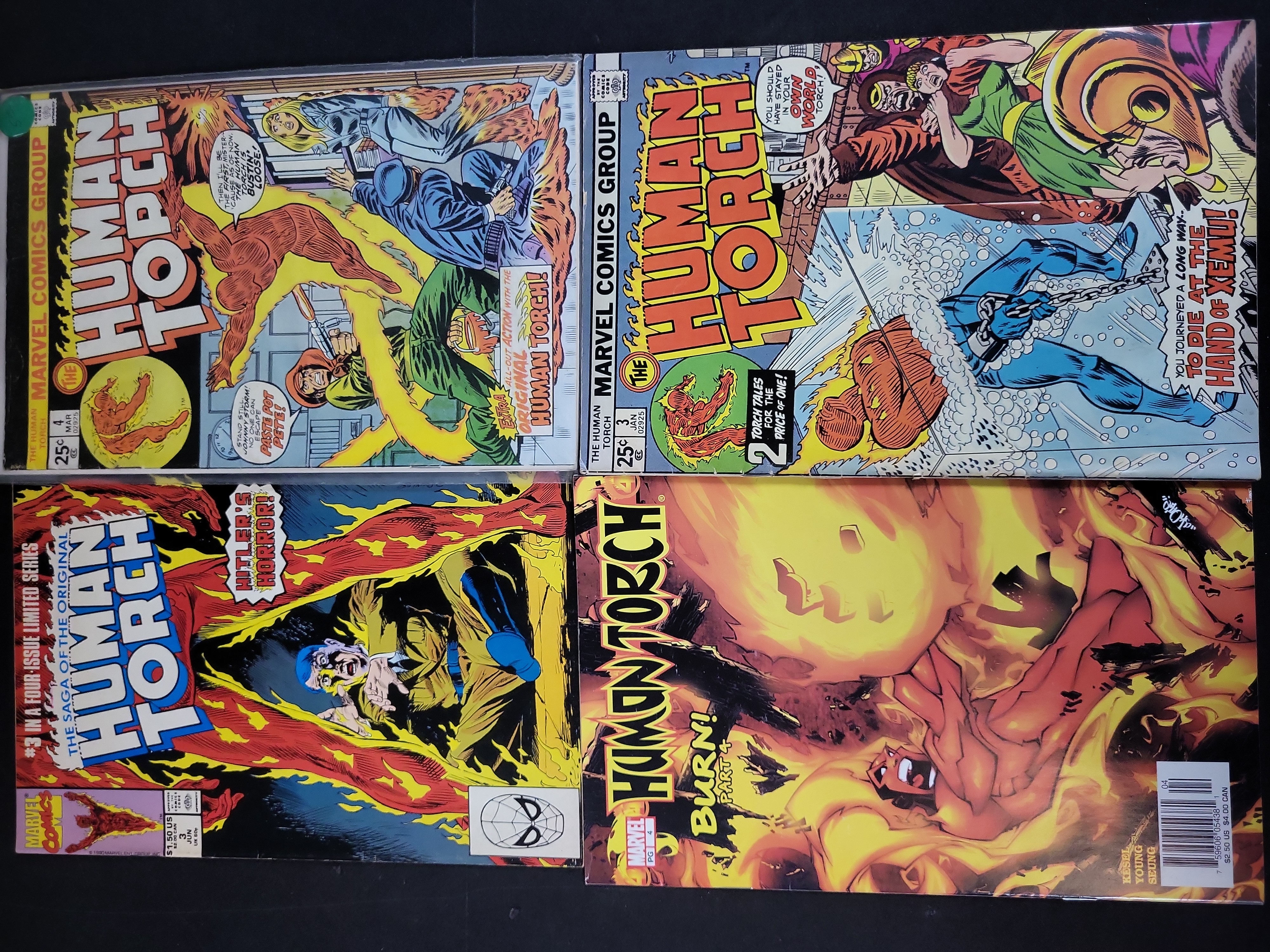 I03685 | A Group of Four Marvel Comic Books Featuring the Human Torch