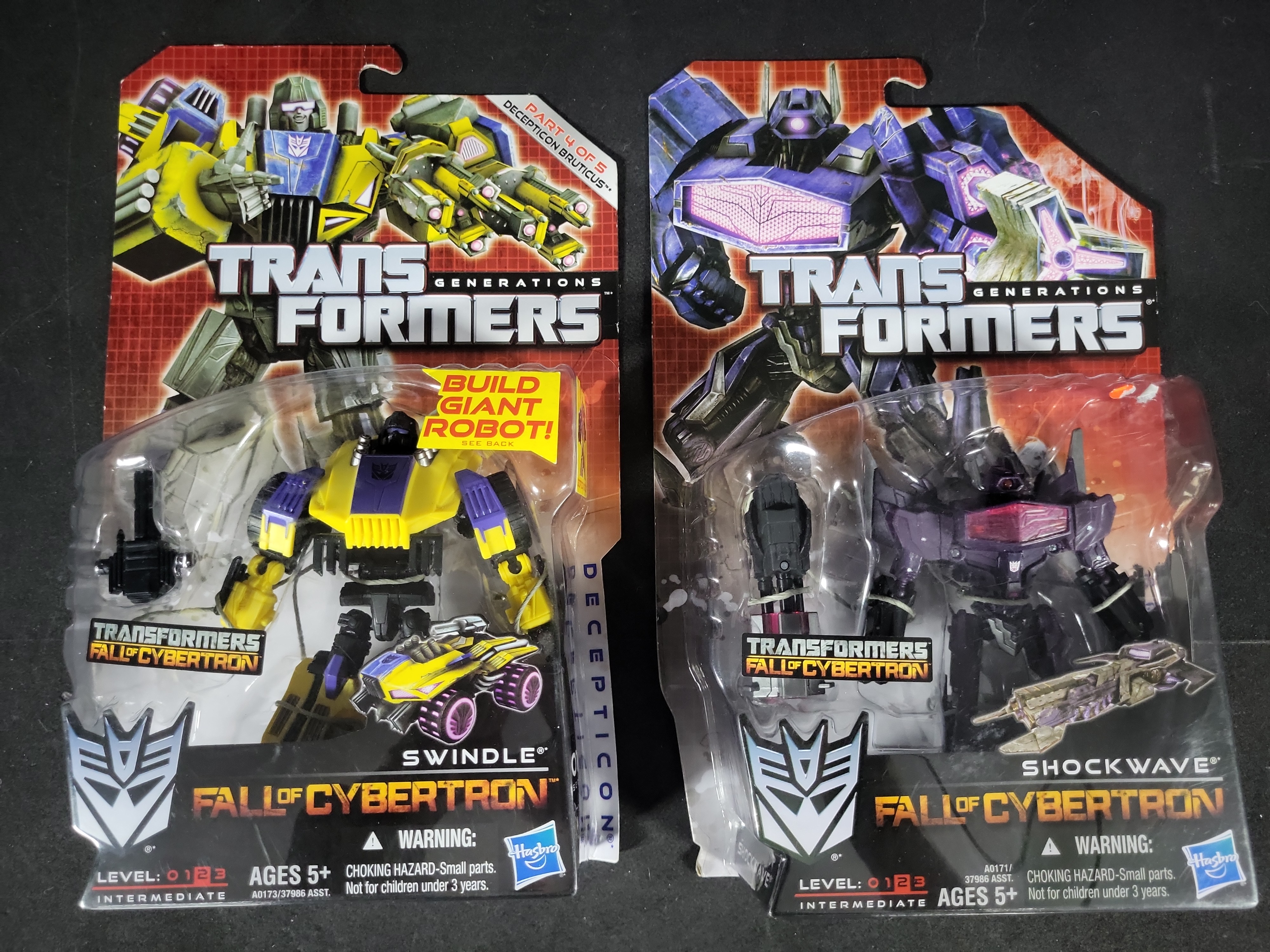 I03524 | A Set of Four Hasbro Transformers Generations Fall of Cybertron Action Figures