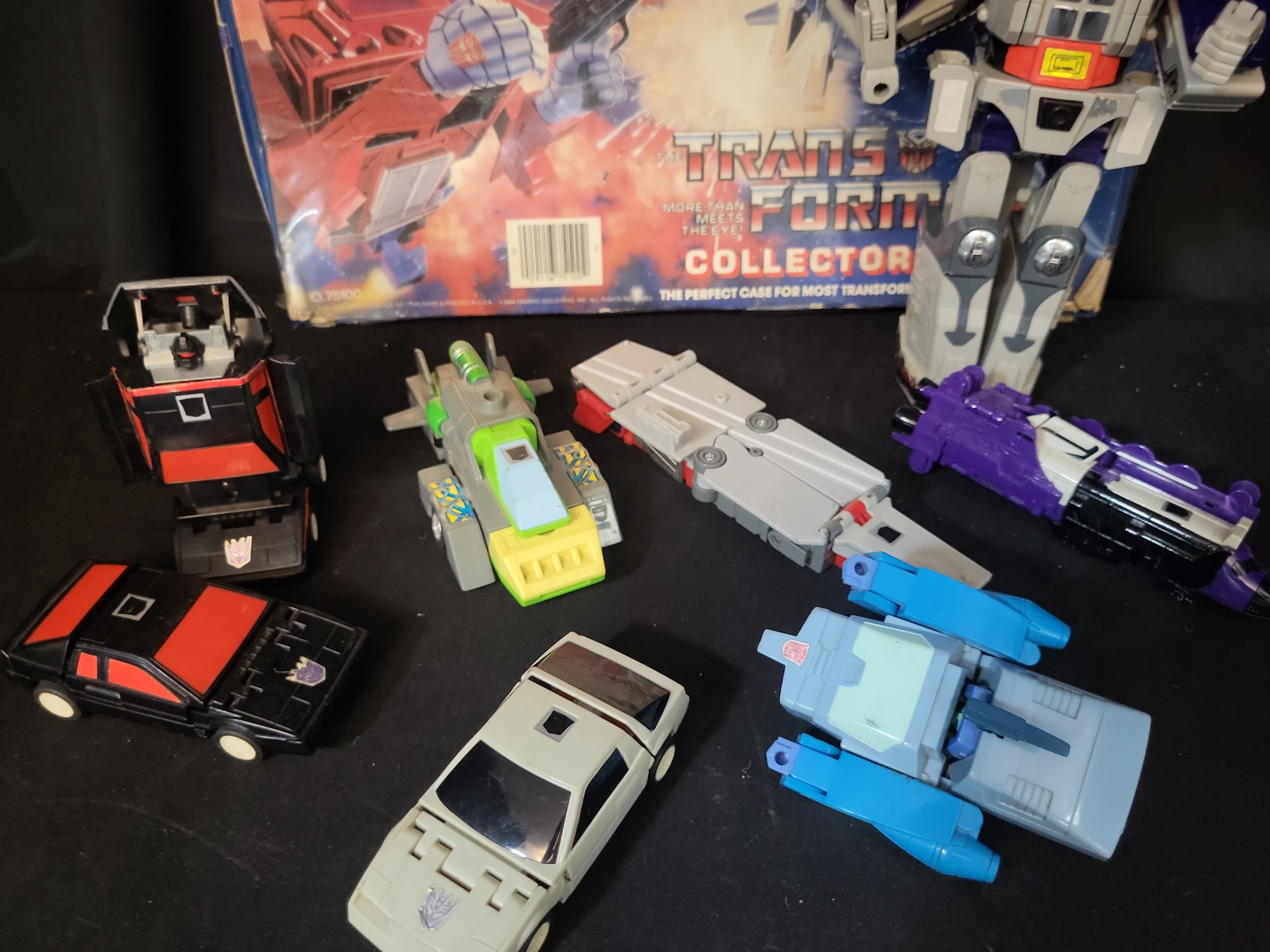I03507 | A Collection of Vintage Hasbro G1 Transformers Action Figures and 1984 Tara Toy Collectors Case