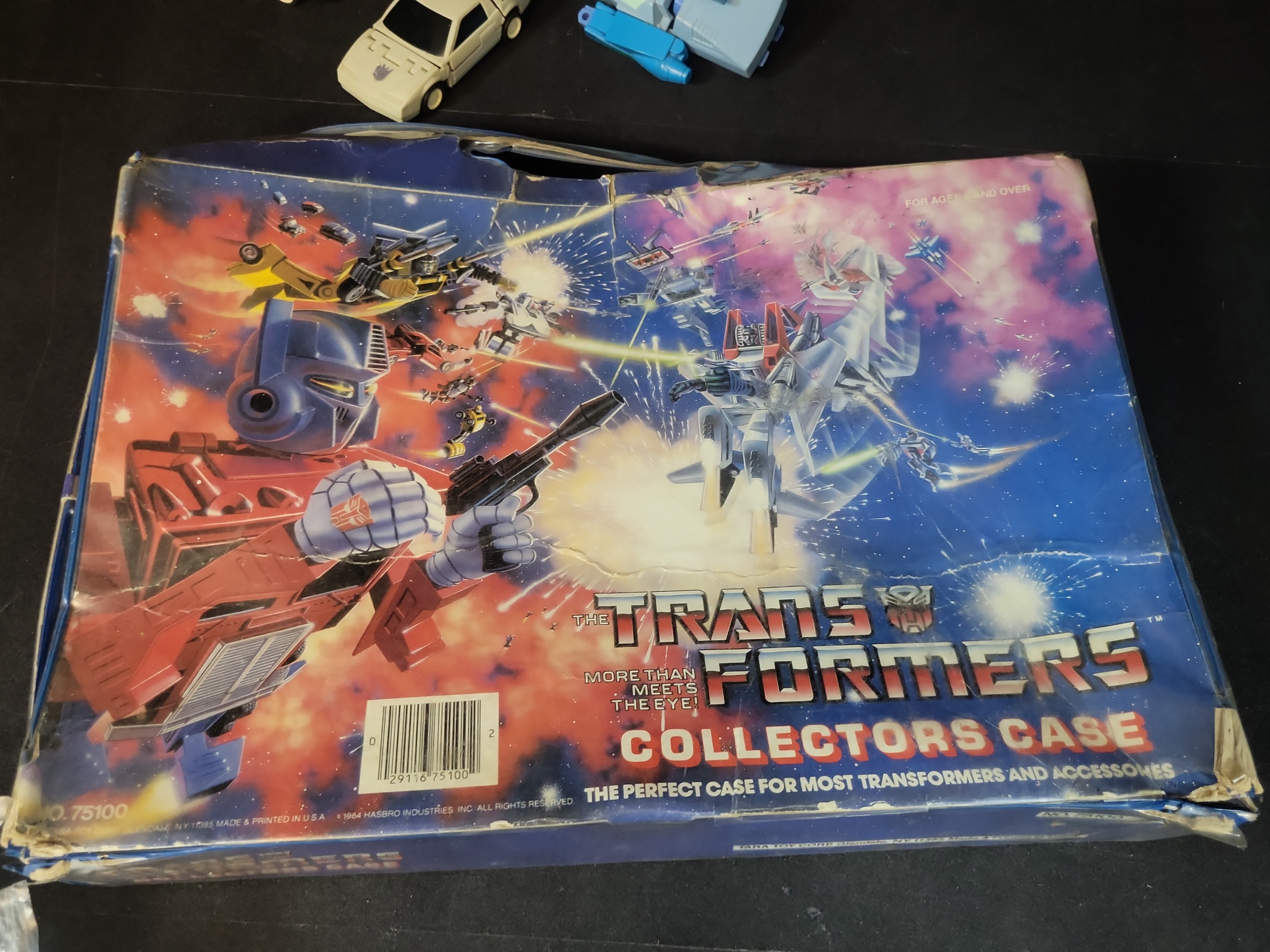 I03507 | A Collection of Vintage Hasbro G1 Transformers Action Figures and 1984 Tara Toy Collectors Case