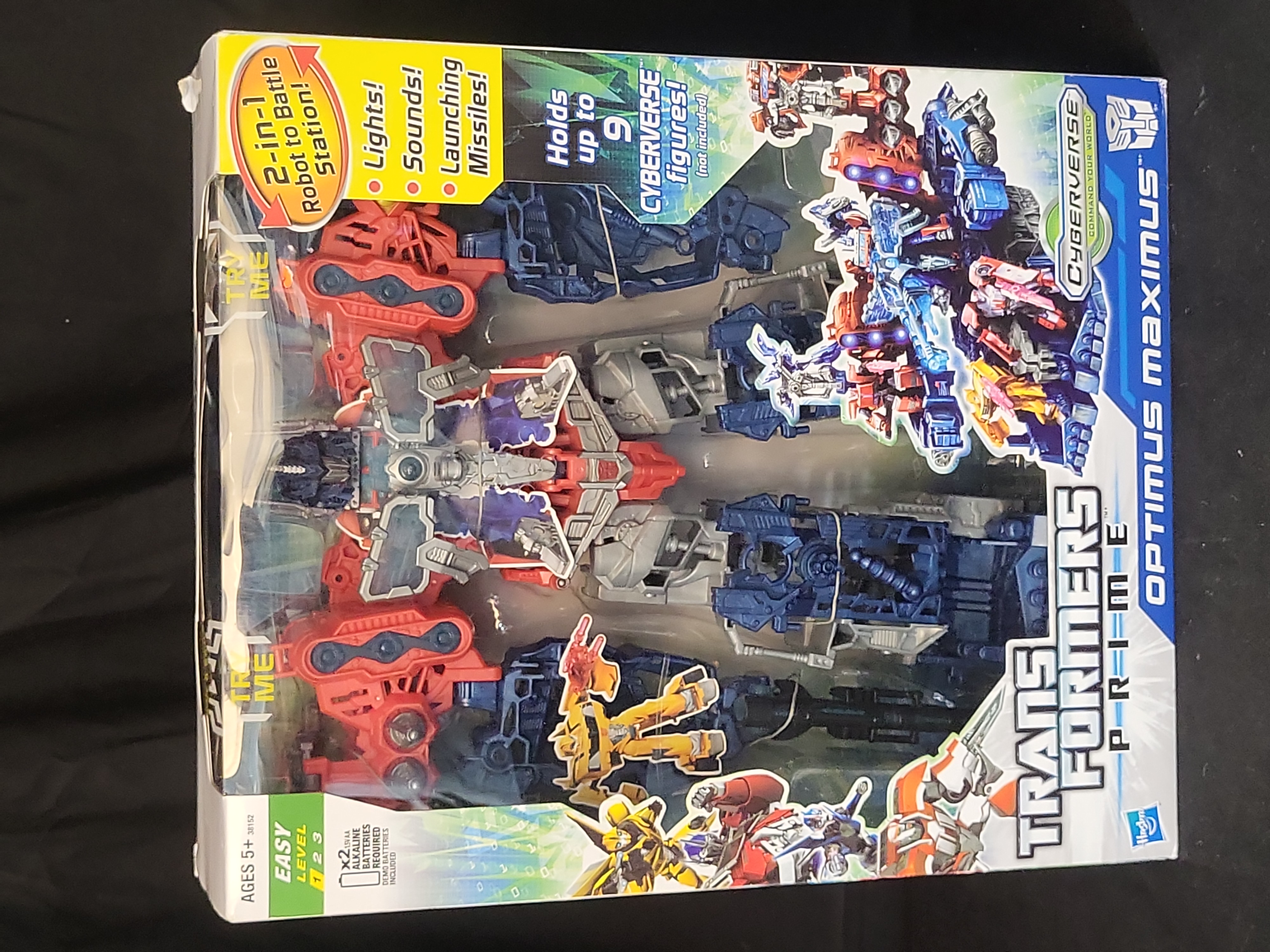 I03515 | Three Hasbro Transformers Prime Cyberverse Action Figures Including Optimus Maximus