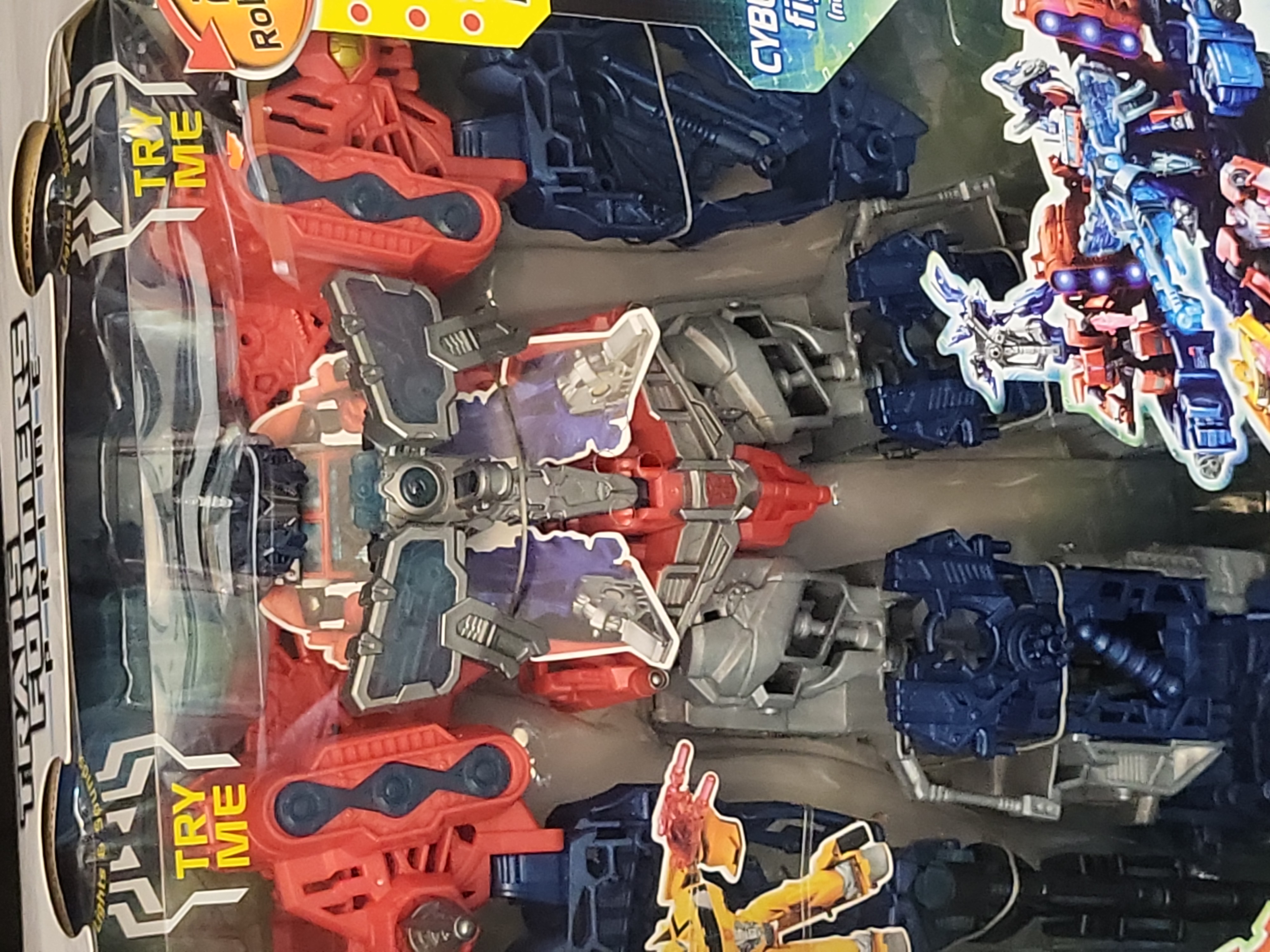 I03515 | Three Hasbro Transformers Prime Cyberverse Action Figures Including Optimus Maximus