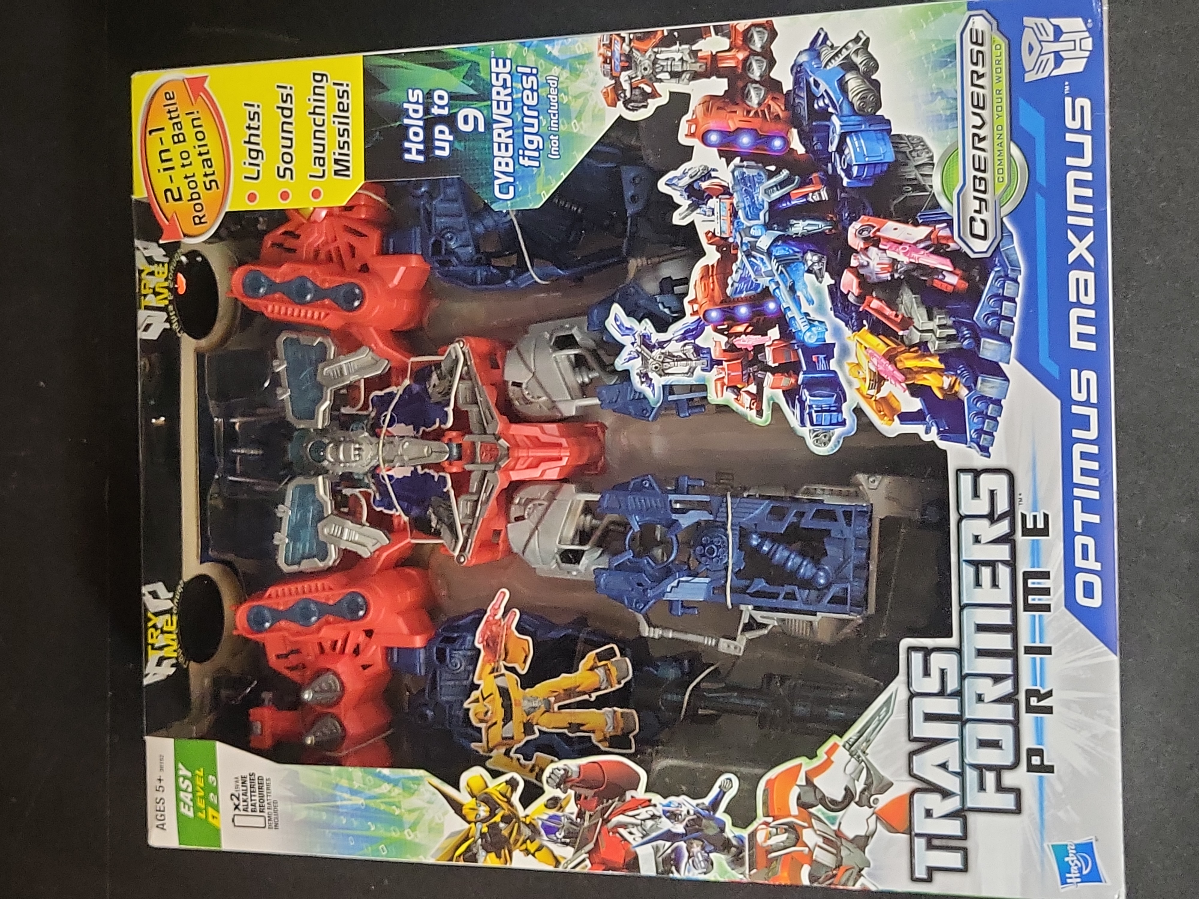 I03515 | Three Hasbro Transformers Prime Cyberverse Action Figures Including Optimus Maximus