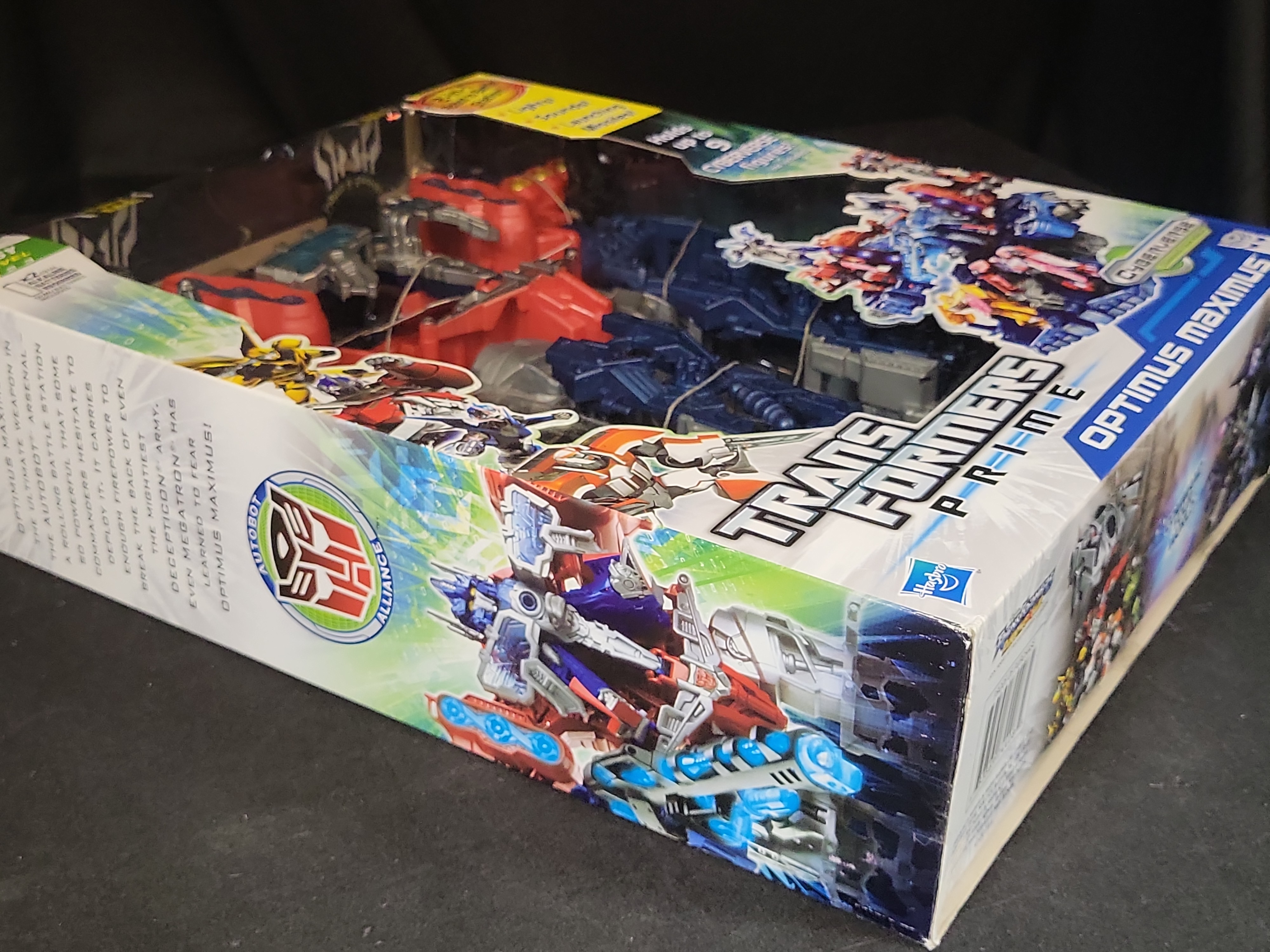 I03515 | Three Hasbro Transformers Prime Cyberverse Action Figures Including Optimus Maximus