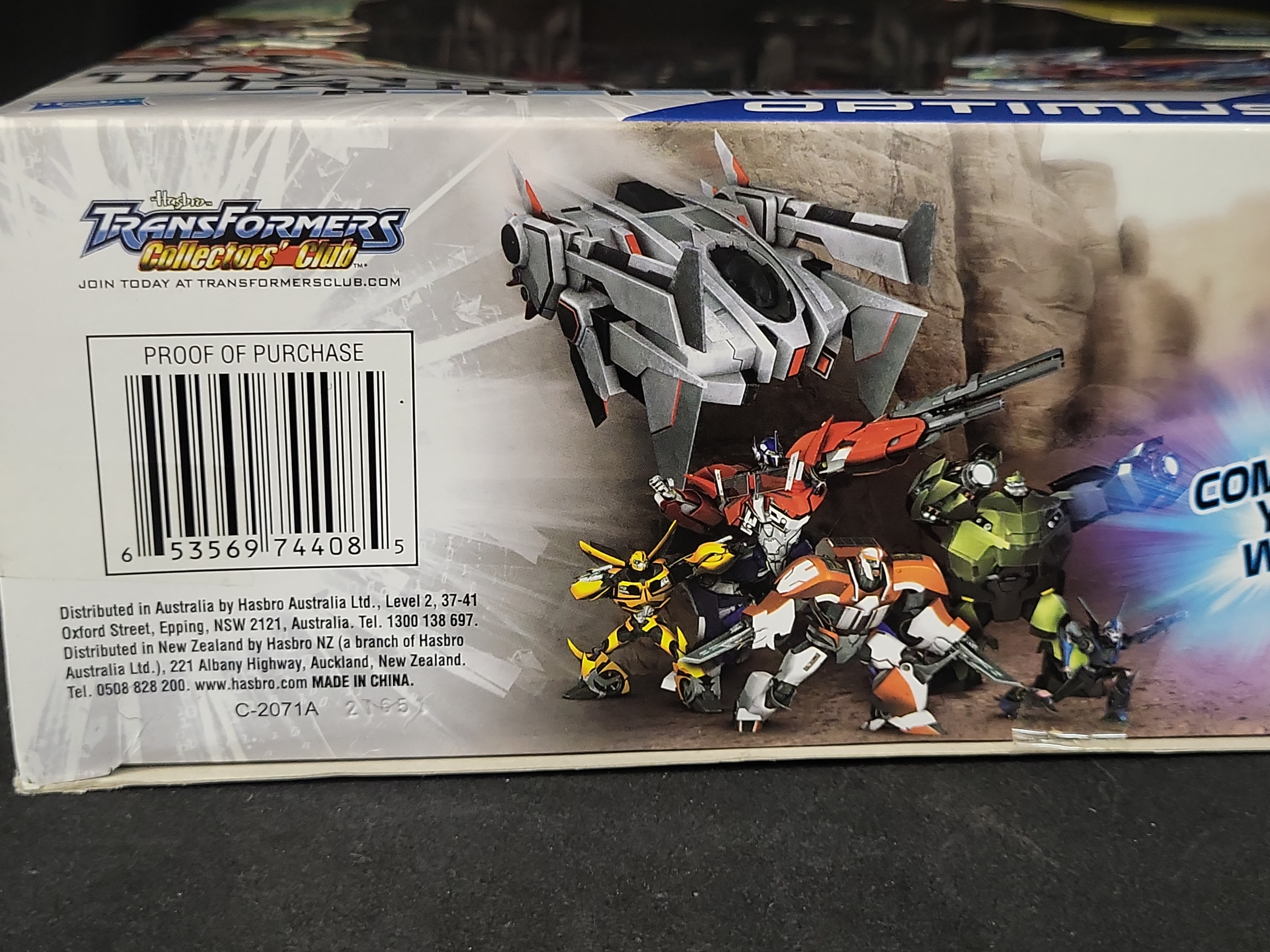 I03515 | Three Hasbro Transformers Prime Cyberverse Action Figures Including Optimus Maximus
