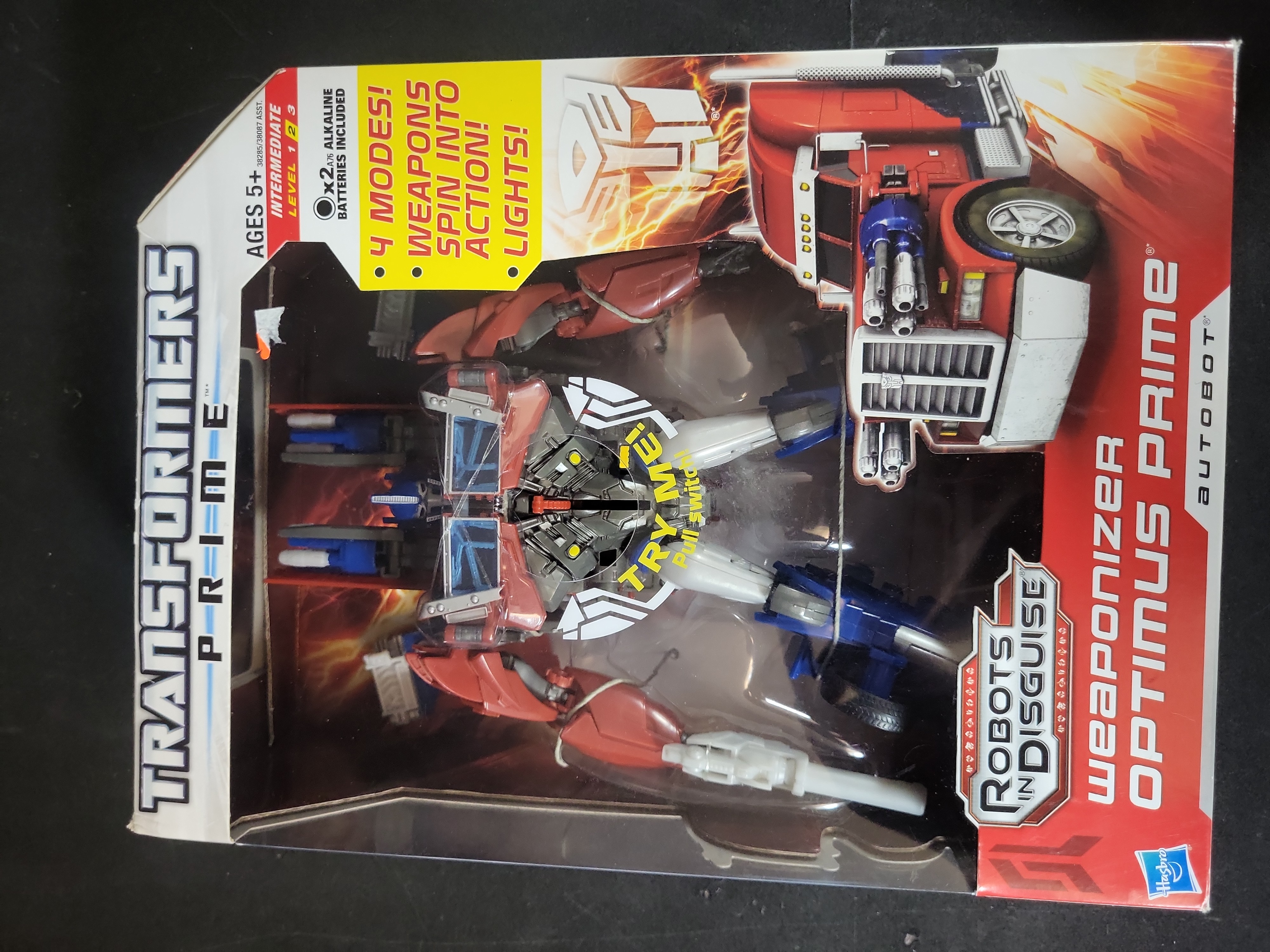 I03518 | A Trio of Hasbro Transformers Prime Action Figures including Weaponizer Optimus Prime