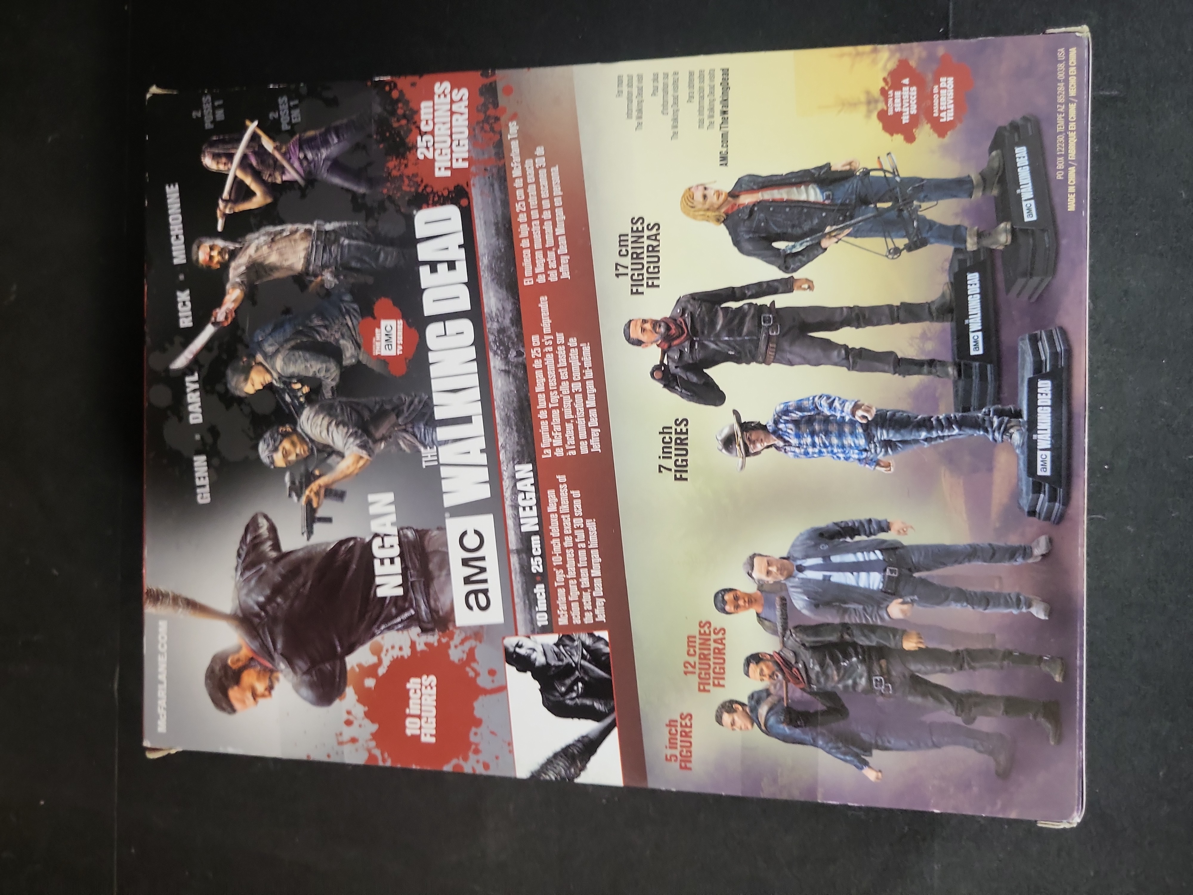 I03517 | Three The Walking Dead Negan Collectibles Including McFarlane Action Figure and Lucille Prop Replicas