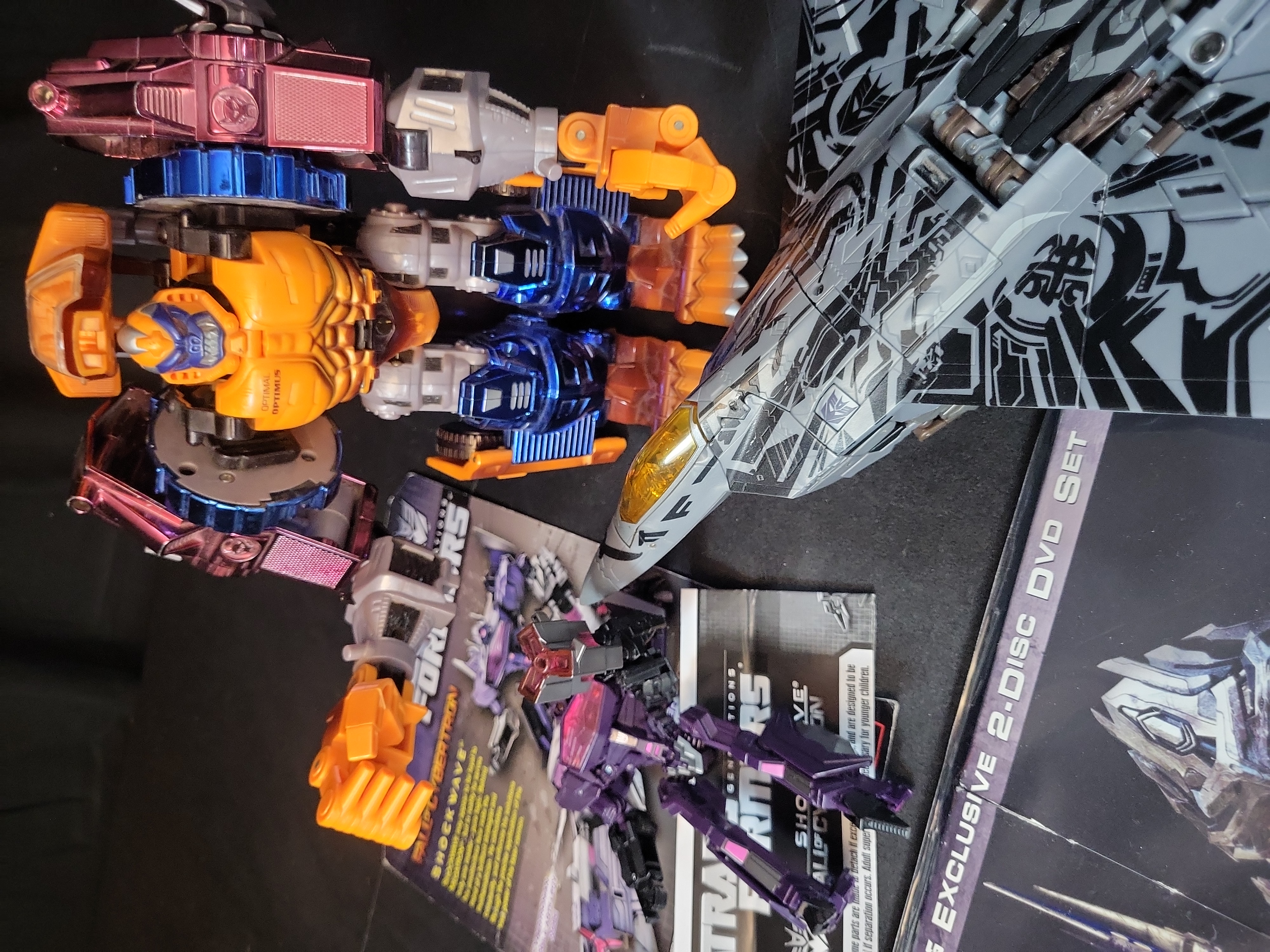 I03514 | A Collection of Transformers Action Figures and a DVD Set