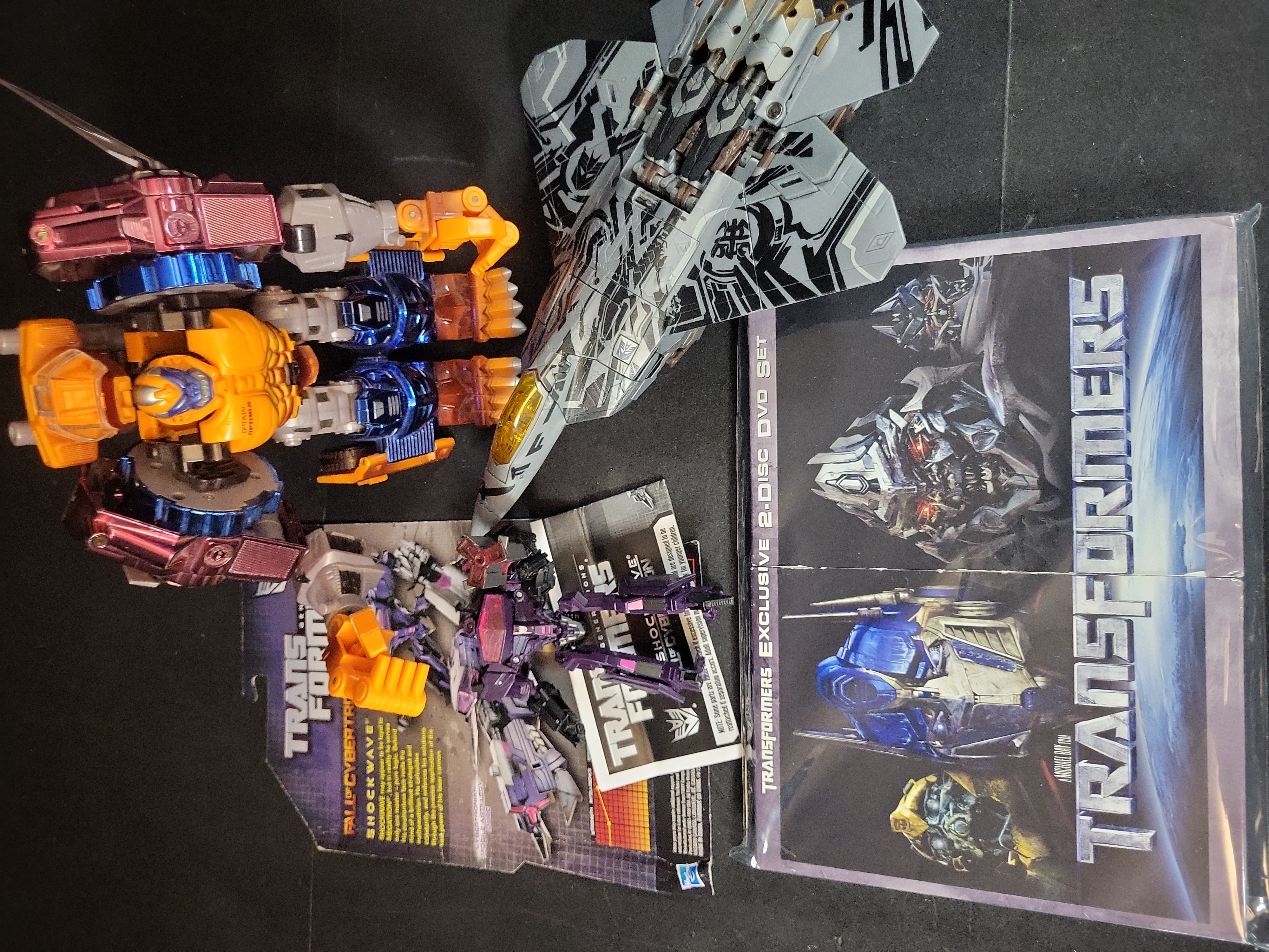 I03514 | A Collection of Transformers Action Figures and a DVD Set