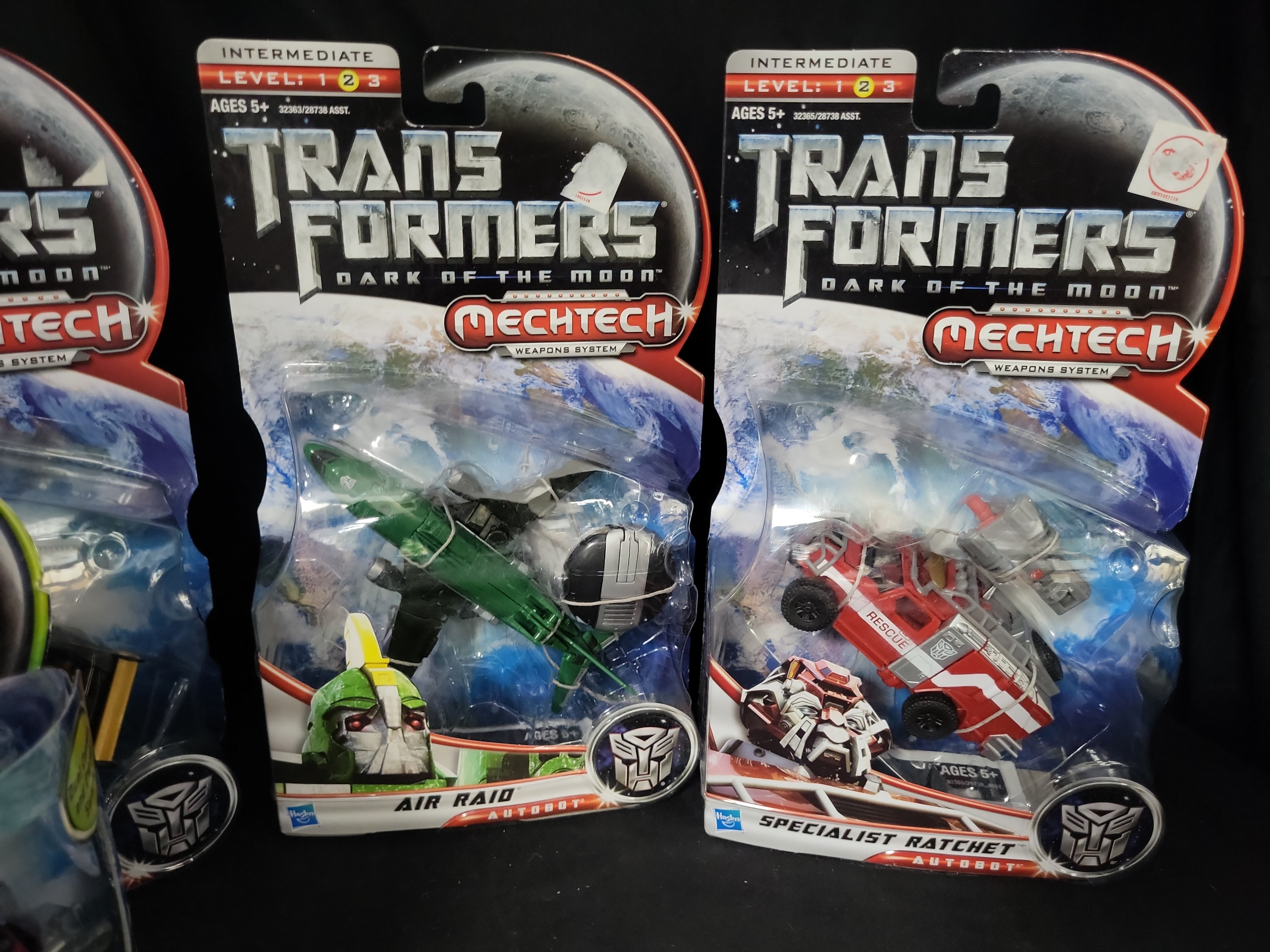 I03548 | A Collection of Five Hasbro Transformers Dark of the Moon Factory Sealed Action Figures