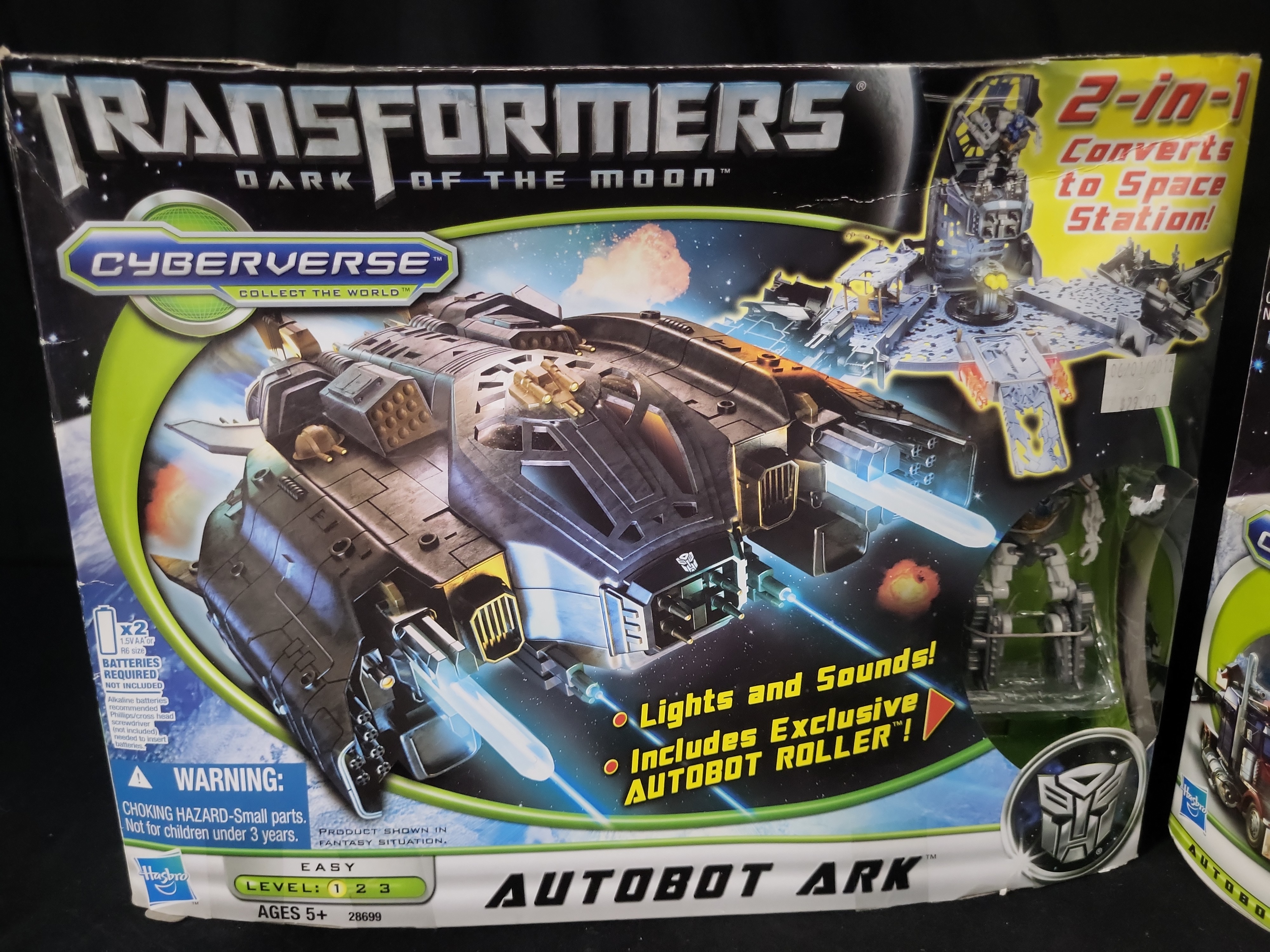 I03536 | A Pair of Hasbro Transformers Dark of the Moon Cyberverse Items