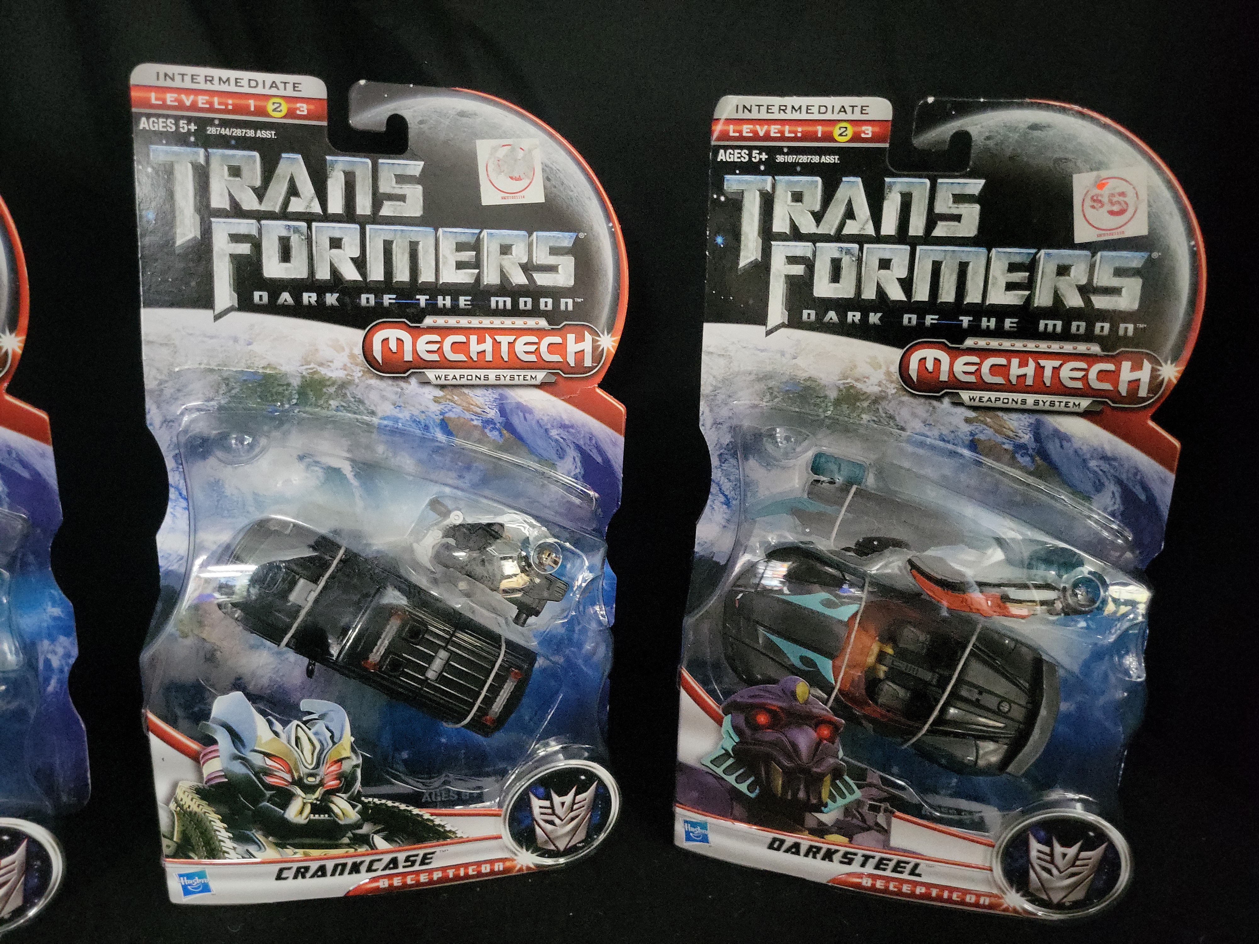I03545 | A Group of Four Hasbro Transformers Dark of the Moon Action Figures