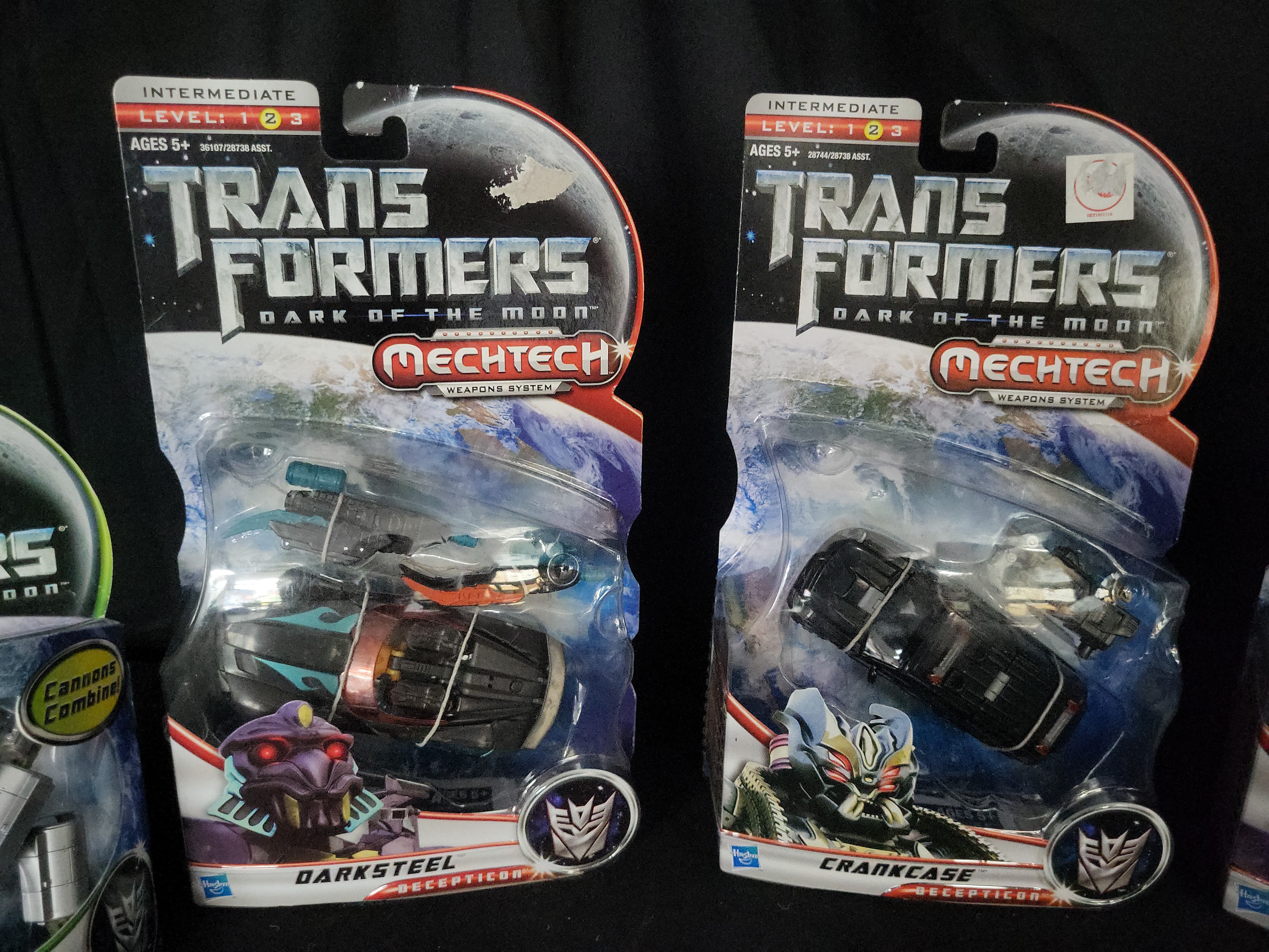 I03545 | A Group of Four Hasbro Transformers Dark of the Moon Action Figures