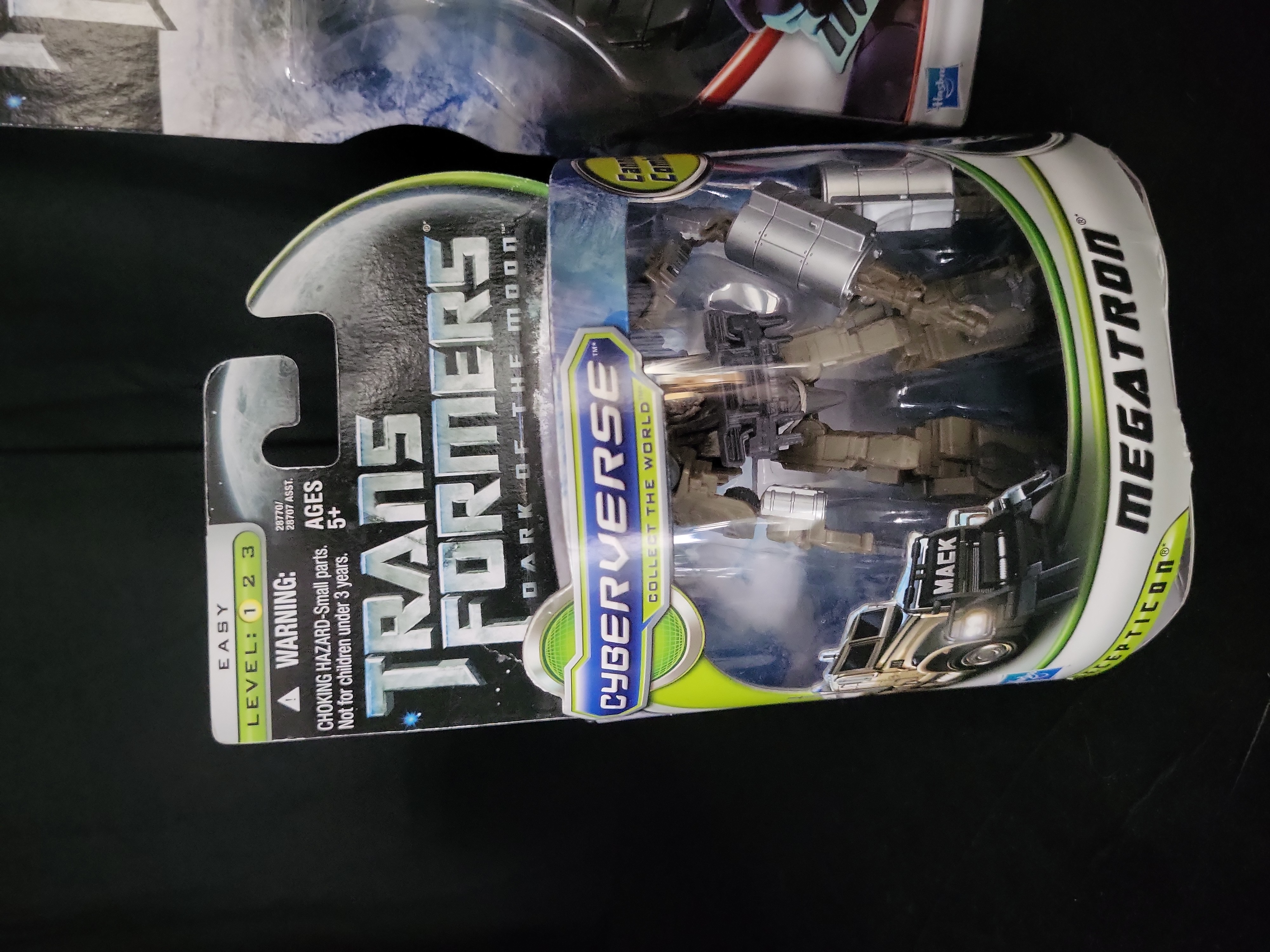 I03545 | A Group of Four Hasbro Transformers Dark of the Moon Action Figures