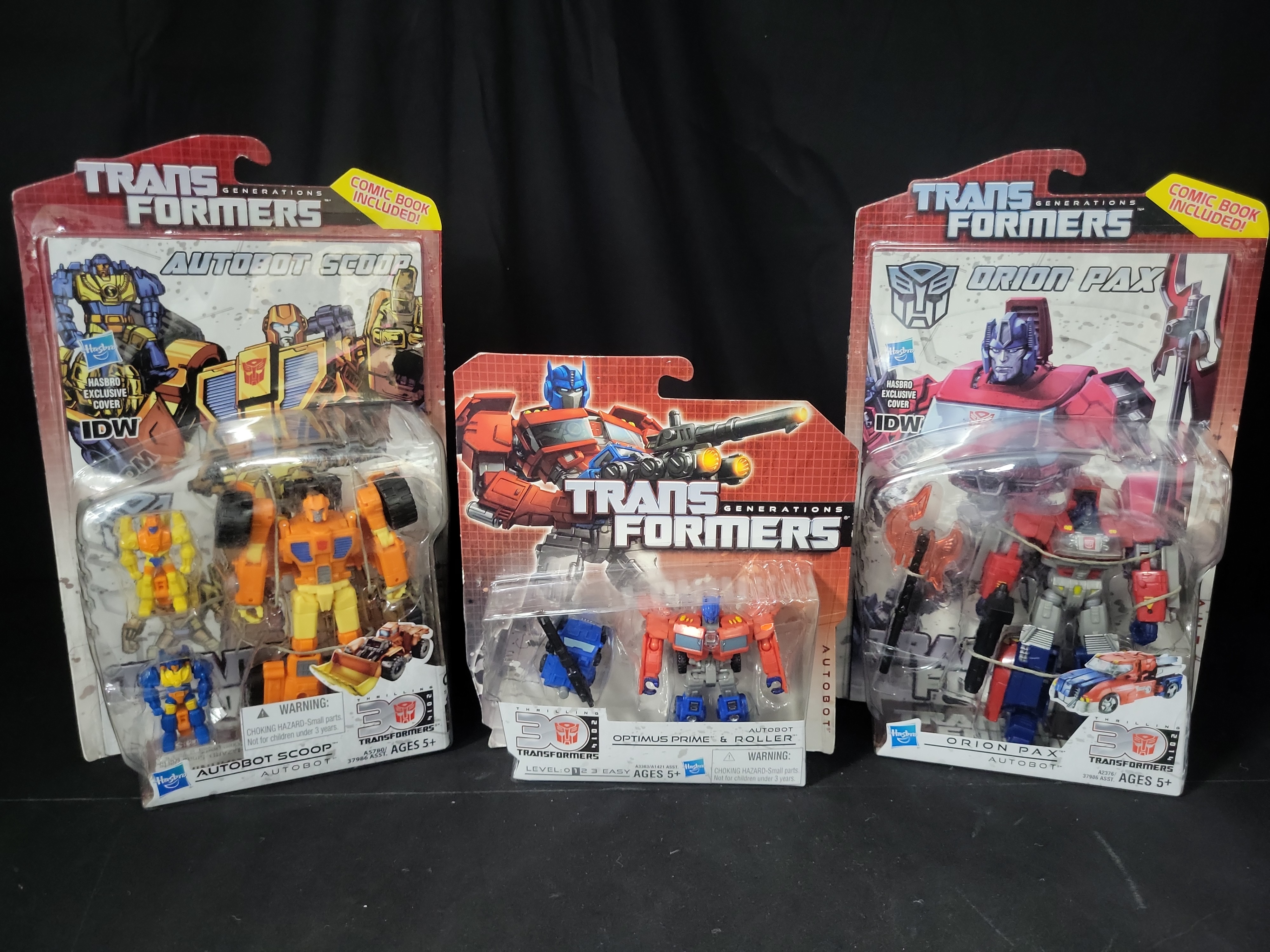 I03546 | Three Hasbro Transformers Generations Thrilling 30 Action Figures