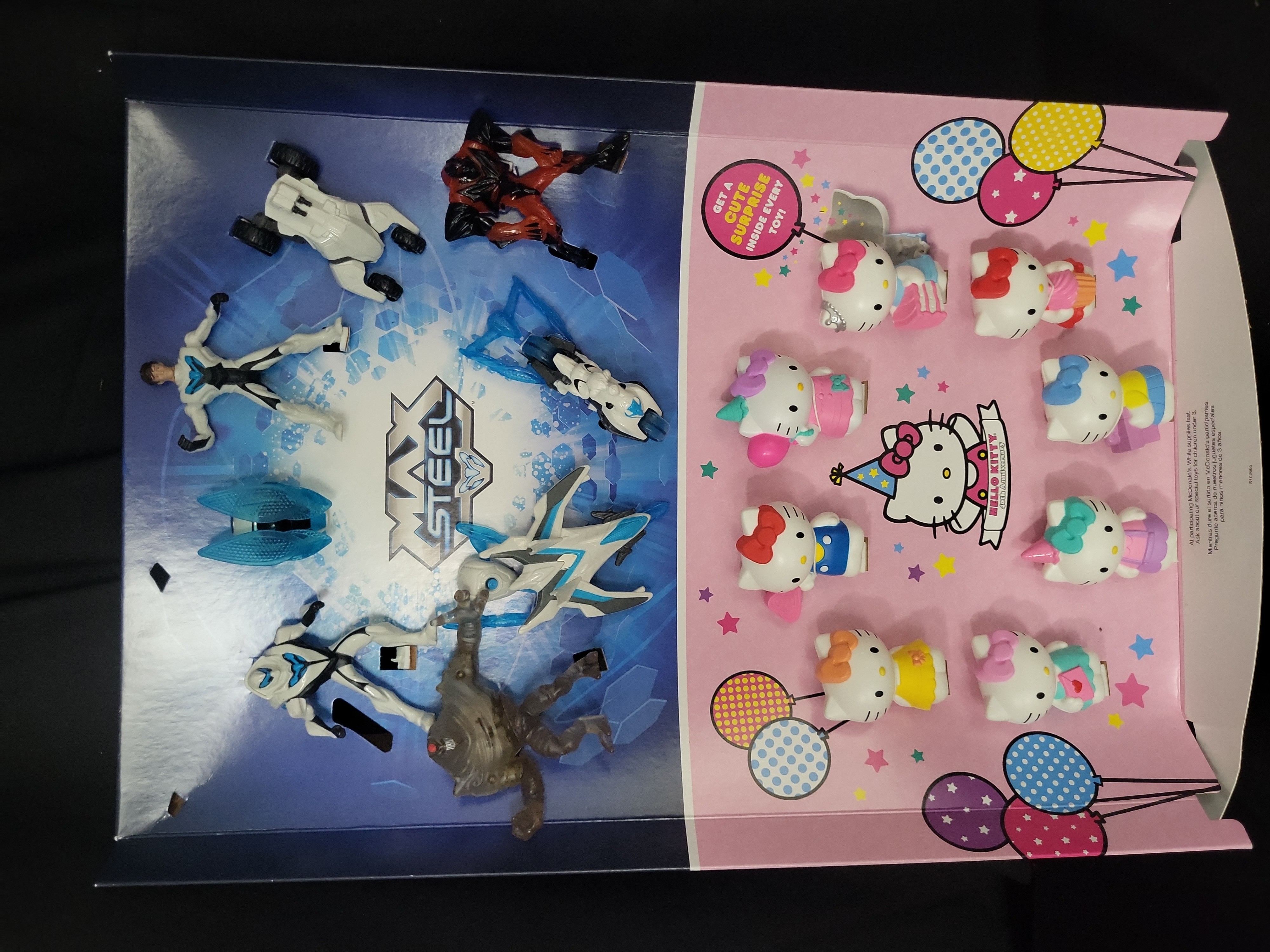 I03185 | McDonald's Happy Meal Promotional In-Store Display Featuring Hello Kitty 40th Anniversary and Max Steel Toys