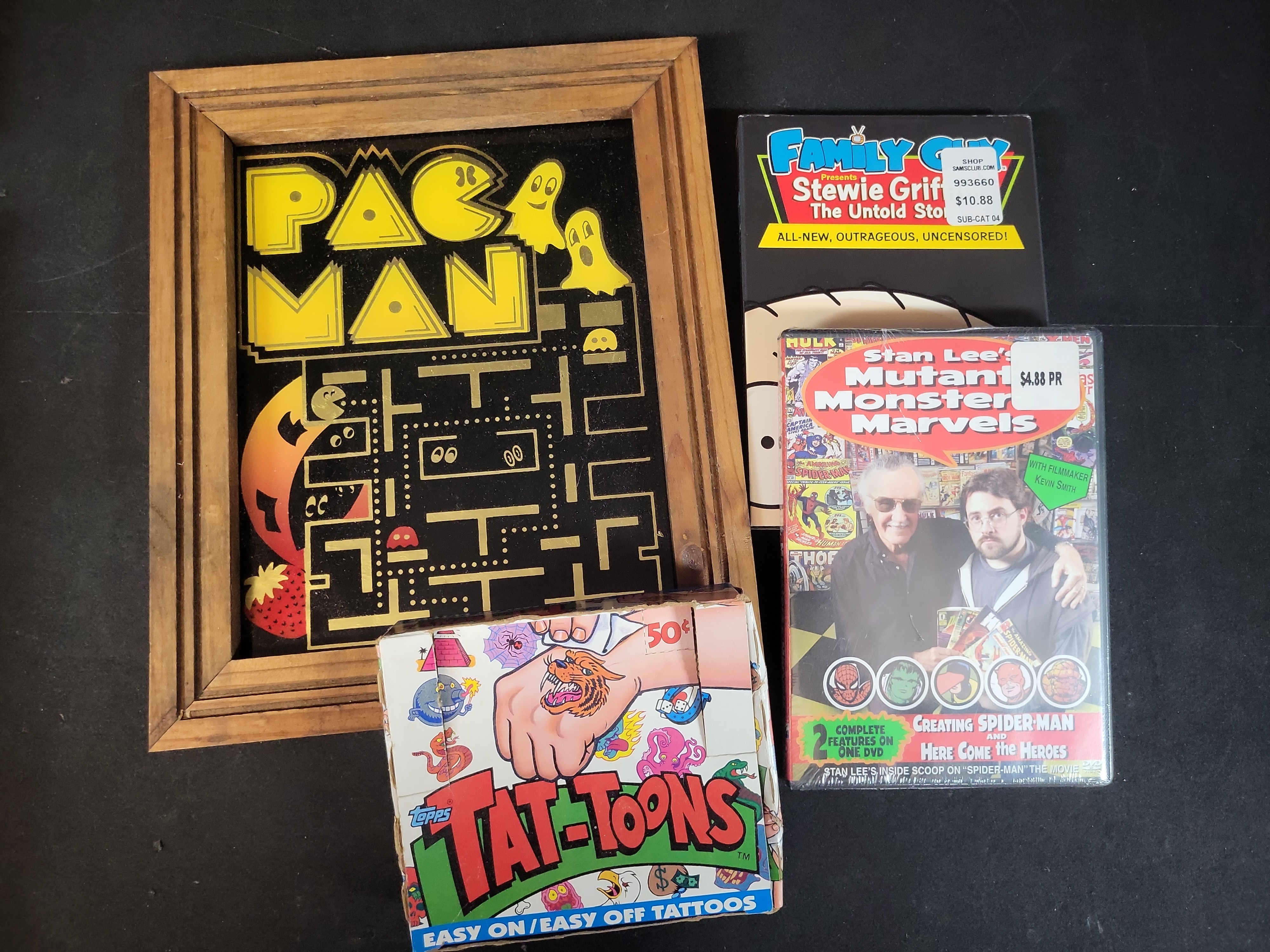 I03660 | A Collection of Vintage Pop Culture Memorabilia and Media Including Topps Tat-Toons and Pac-Man Mirror