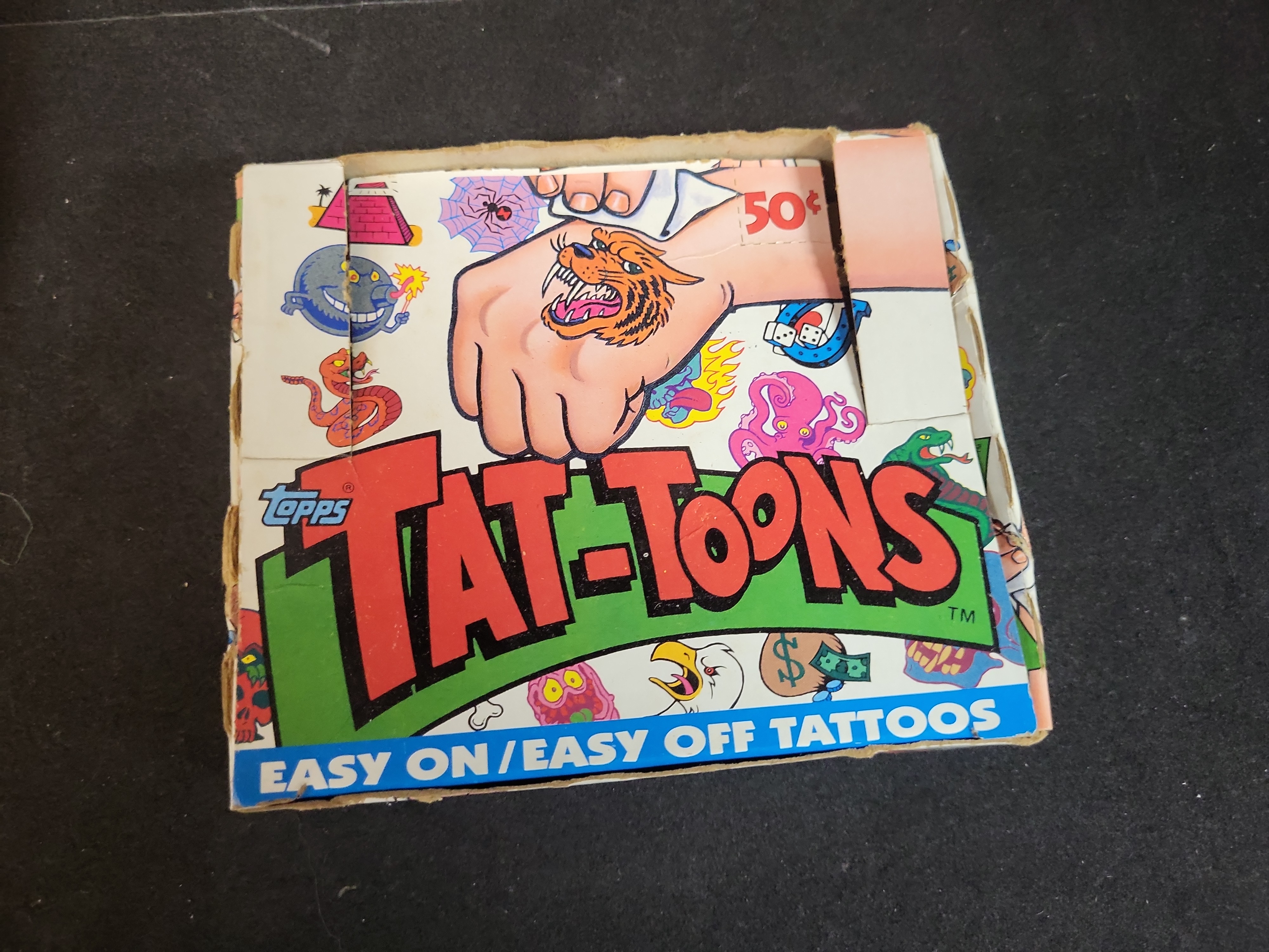 I03660 | A Collection of Vintage Pop Culture Memorabilia and Media Including Topps Tat-Toons and Pac-Man Mirror