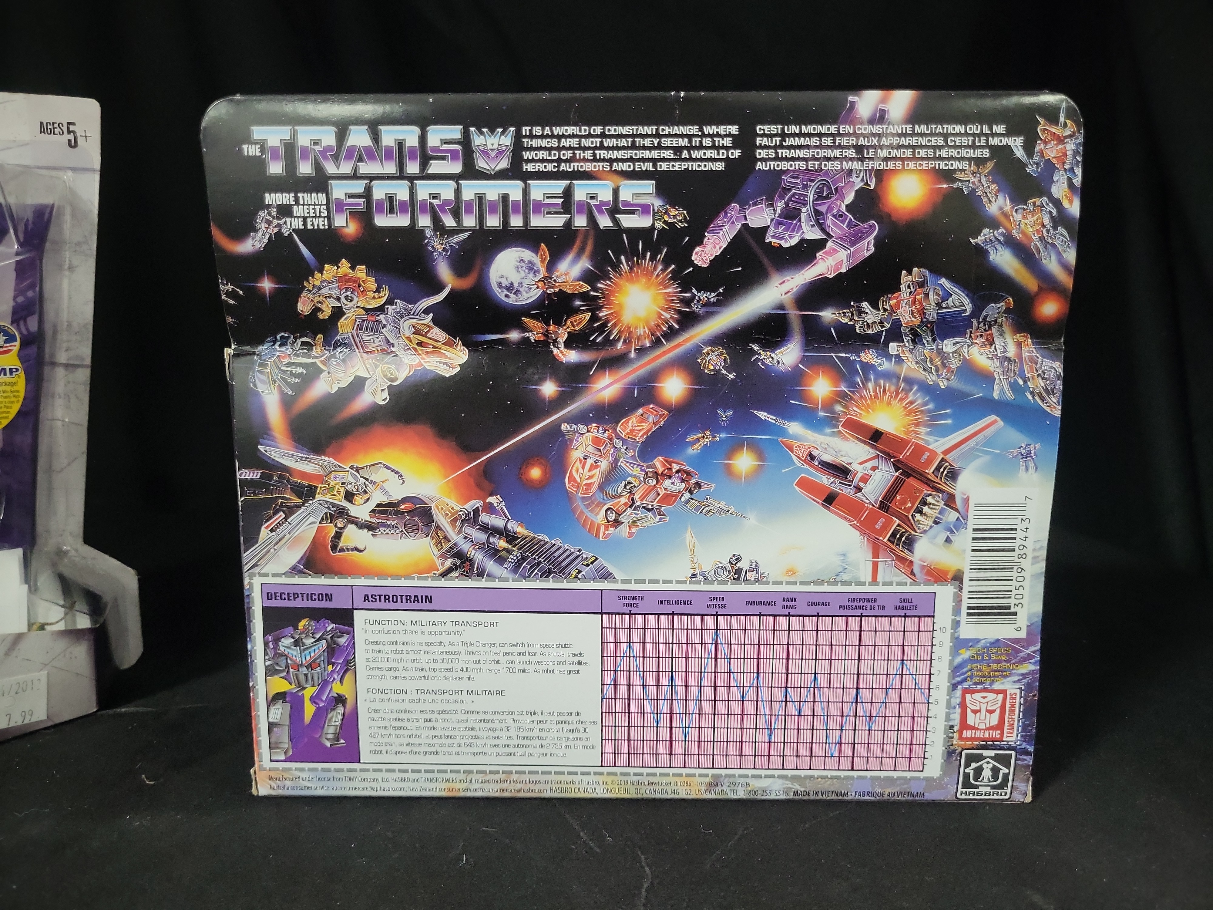 I03540 | Two Hasbro Transformers Action Figures, Cybertron Lugnutz and Vintage G1 Reissue Astrotrain
