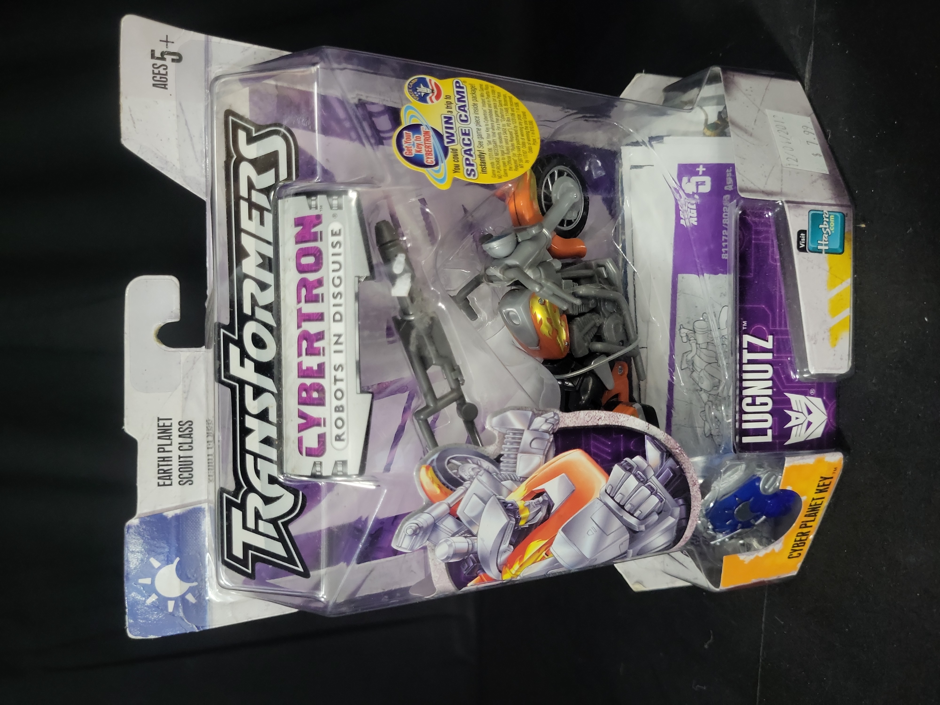 I03540 | Two Hasbro Transformers Action Figures, Cybertron Lugnutz and Vintage G1 Reissue Astrotrain