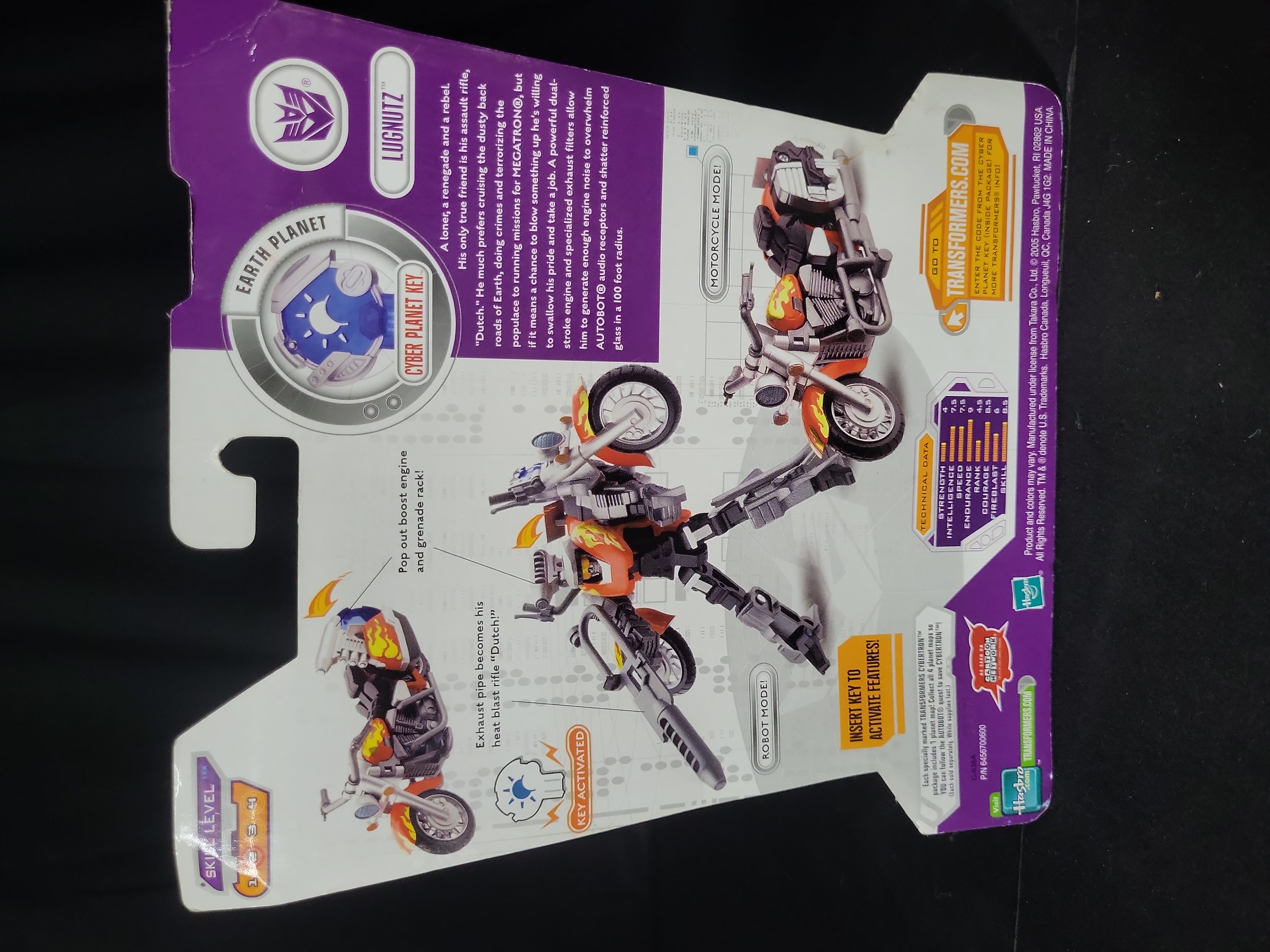 I03540 | Two Hasbro Transformers Action Figures, Cybertron Lugnutz and Vintage G1 Reissue Astrotrain