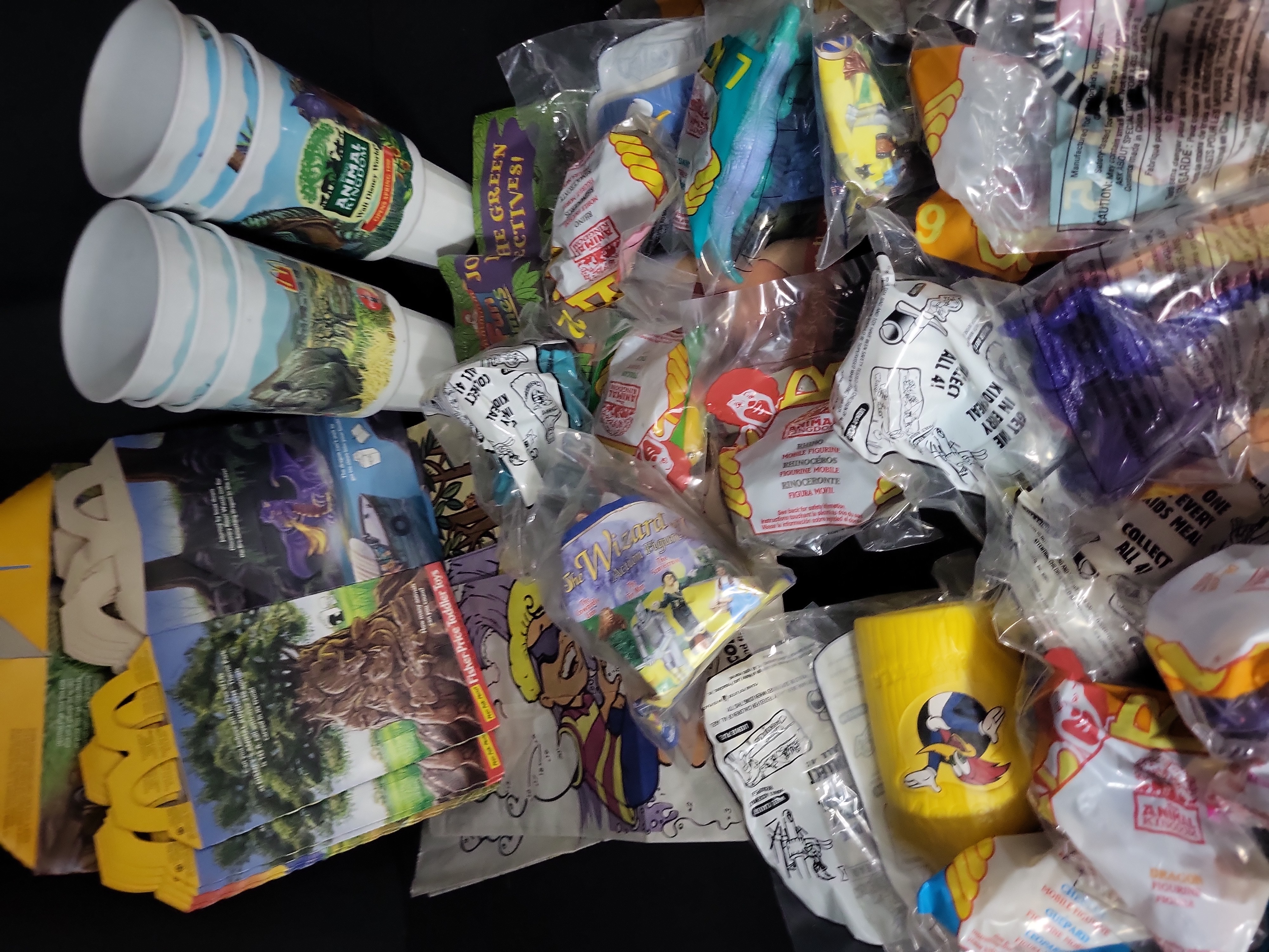 I03174 | An Assortment of Vintage McDonald's Happy Meal Toys and Promotional Ephemera including Disney's Animal Kingdom and Woody Woodpecker