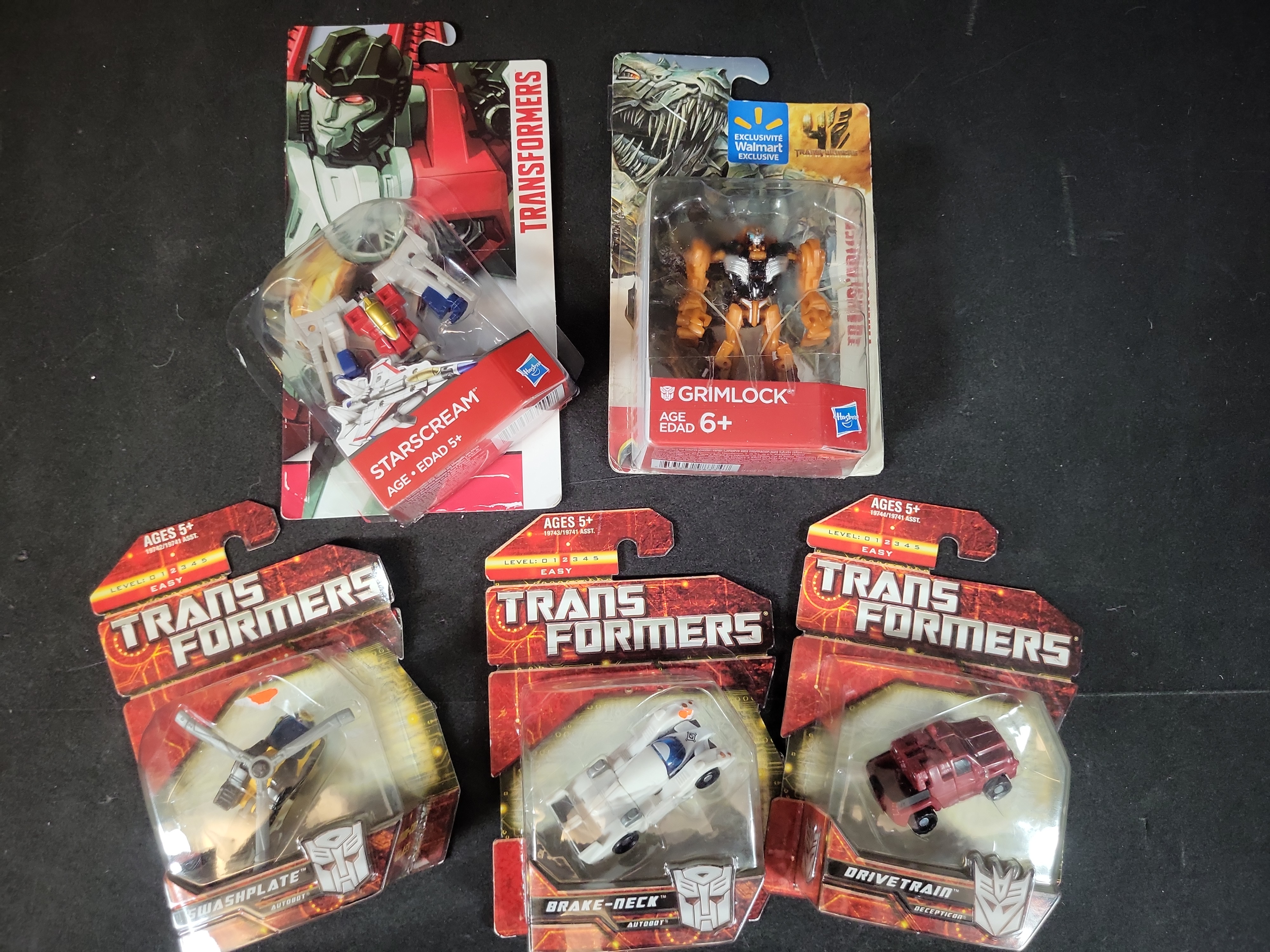I03511 | Five Hasbro Transformers Action Figures in Original Factory Packaging