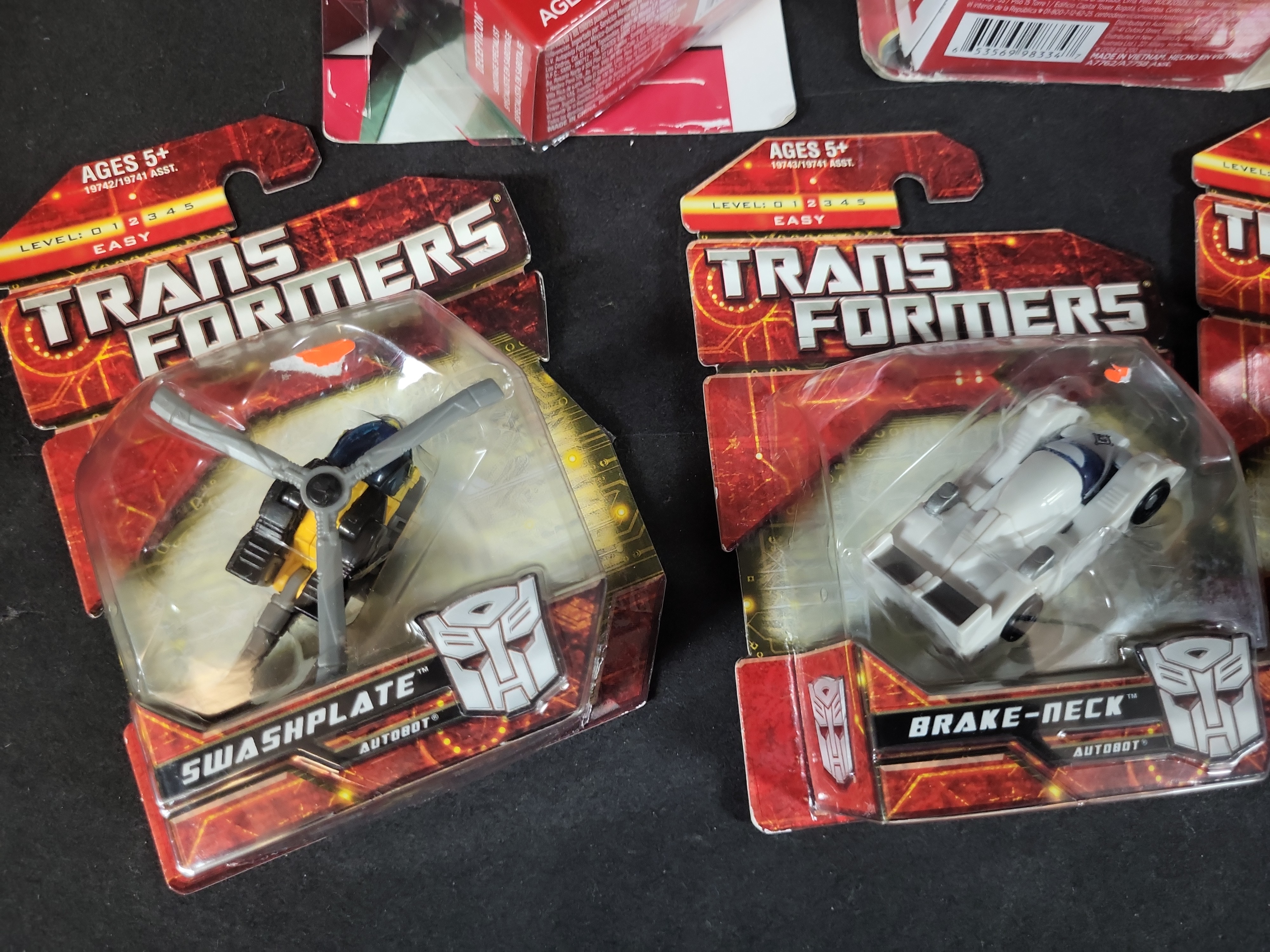 I03511 | Five Hasbro Transformers Action Figures in Original Factory Packaging