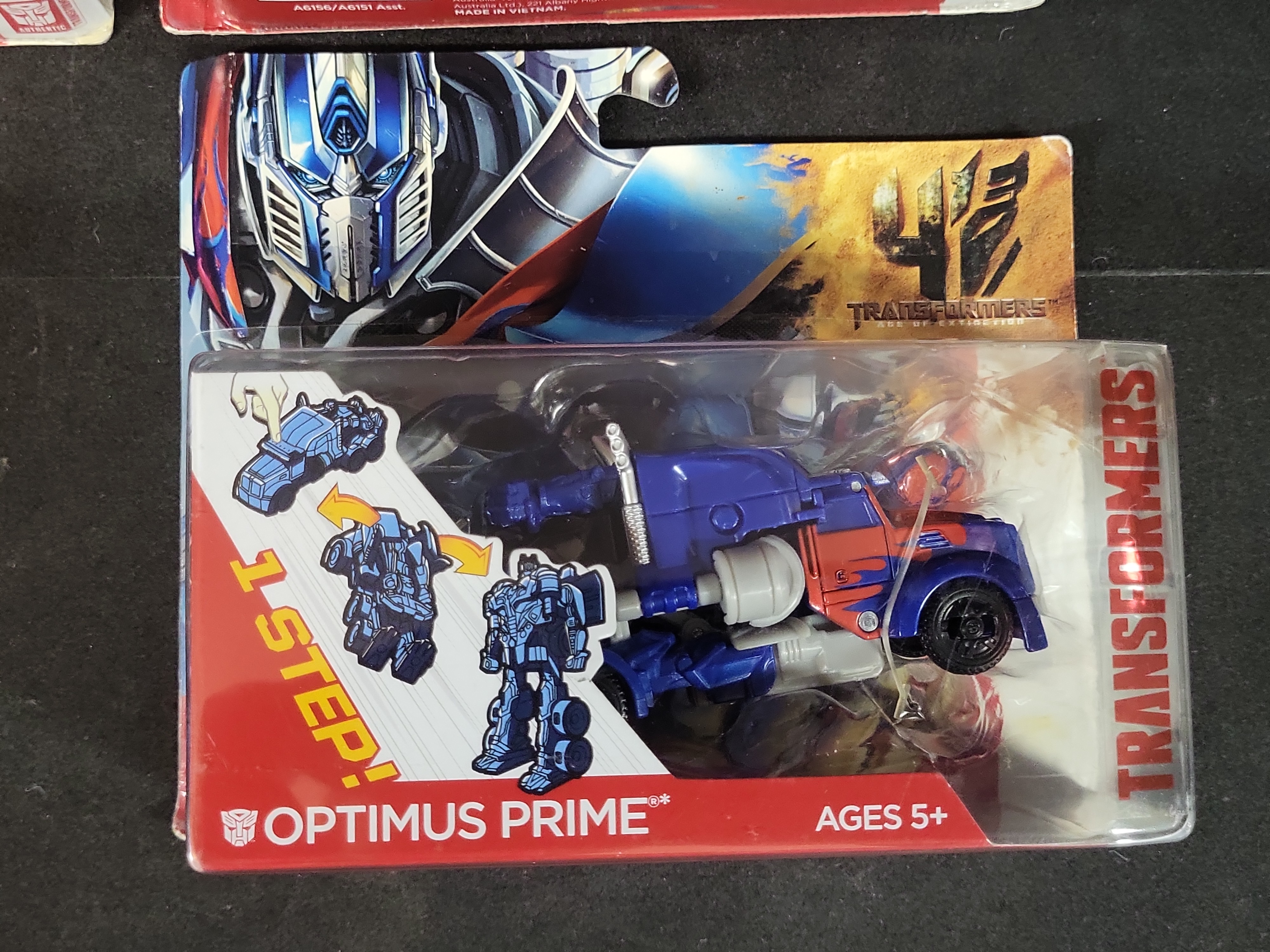 I03519 | Four Hasbro Transformers Age of Extinction 1-Step Changers Action Figures