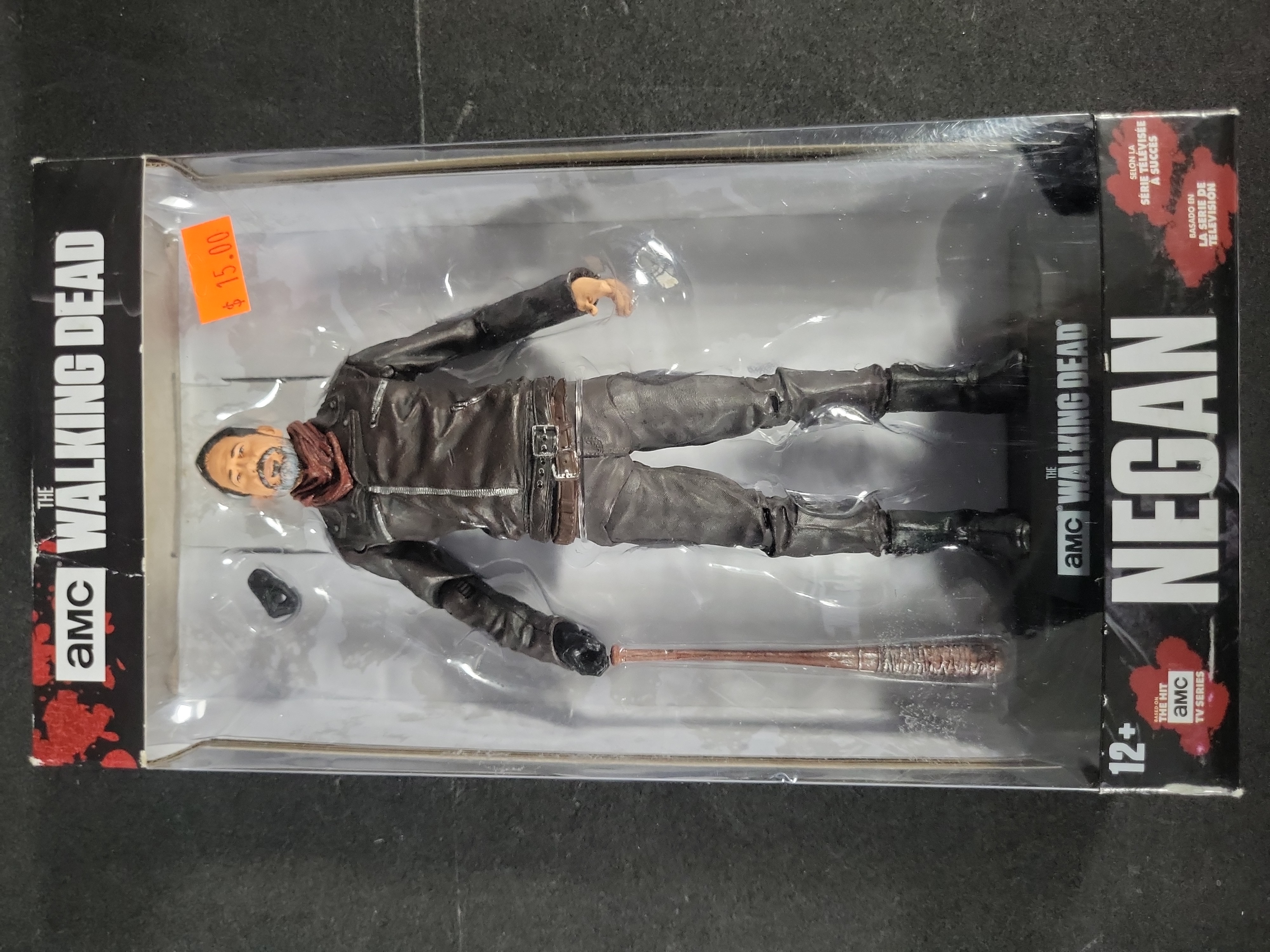 I03529 | Five The Walking Dead Collectible Items Including McFarlane Toys Action Figures and Cryptozoic Trading Cards
