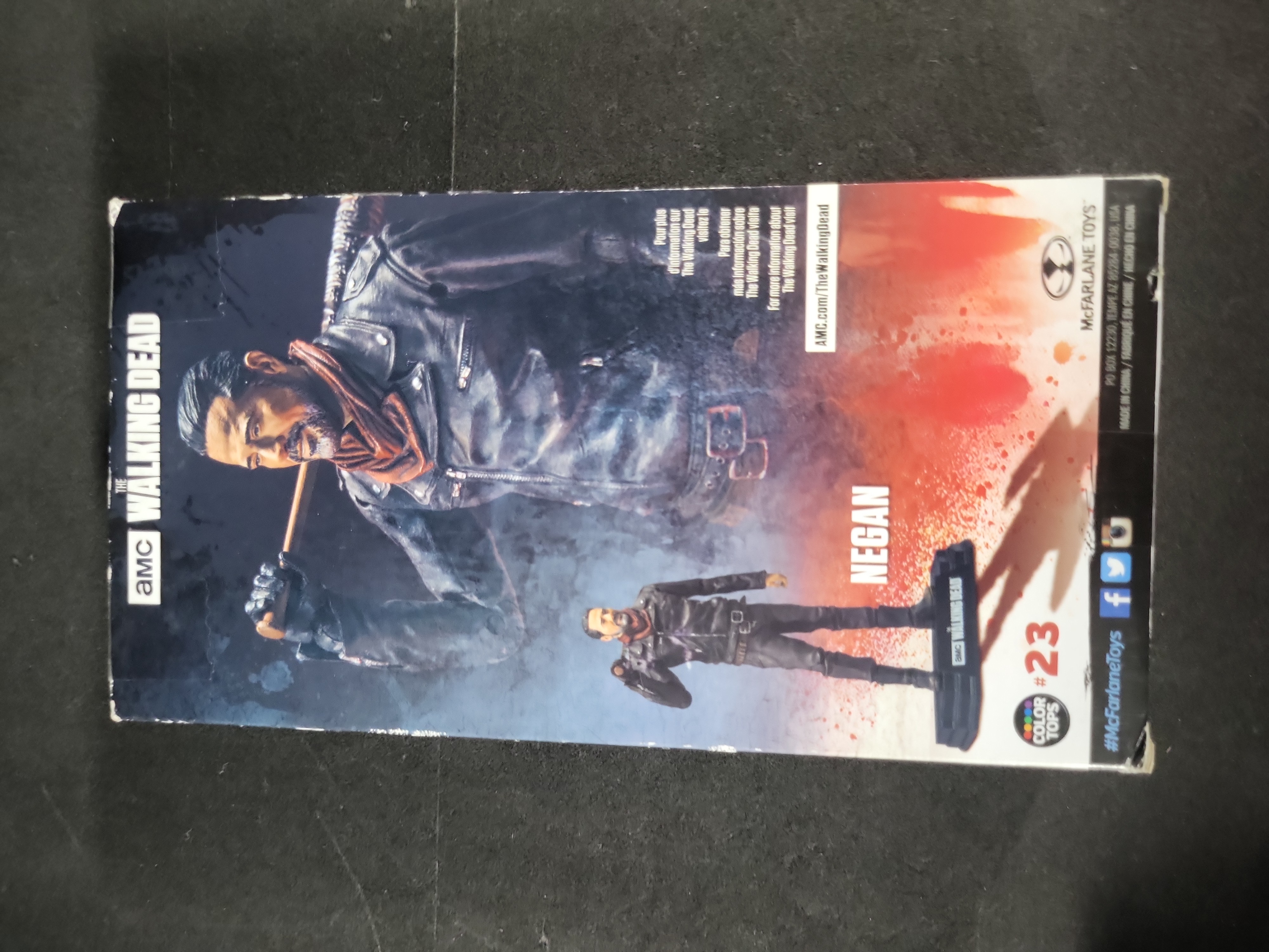 I03529 | Five The Walking Dead Collectible Items Including McFarlane Toys Action Figures and Cryptozoic Trading Cards