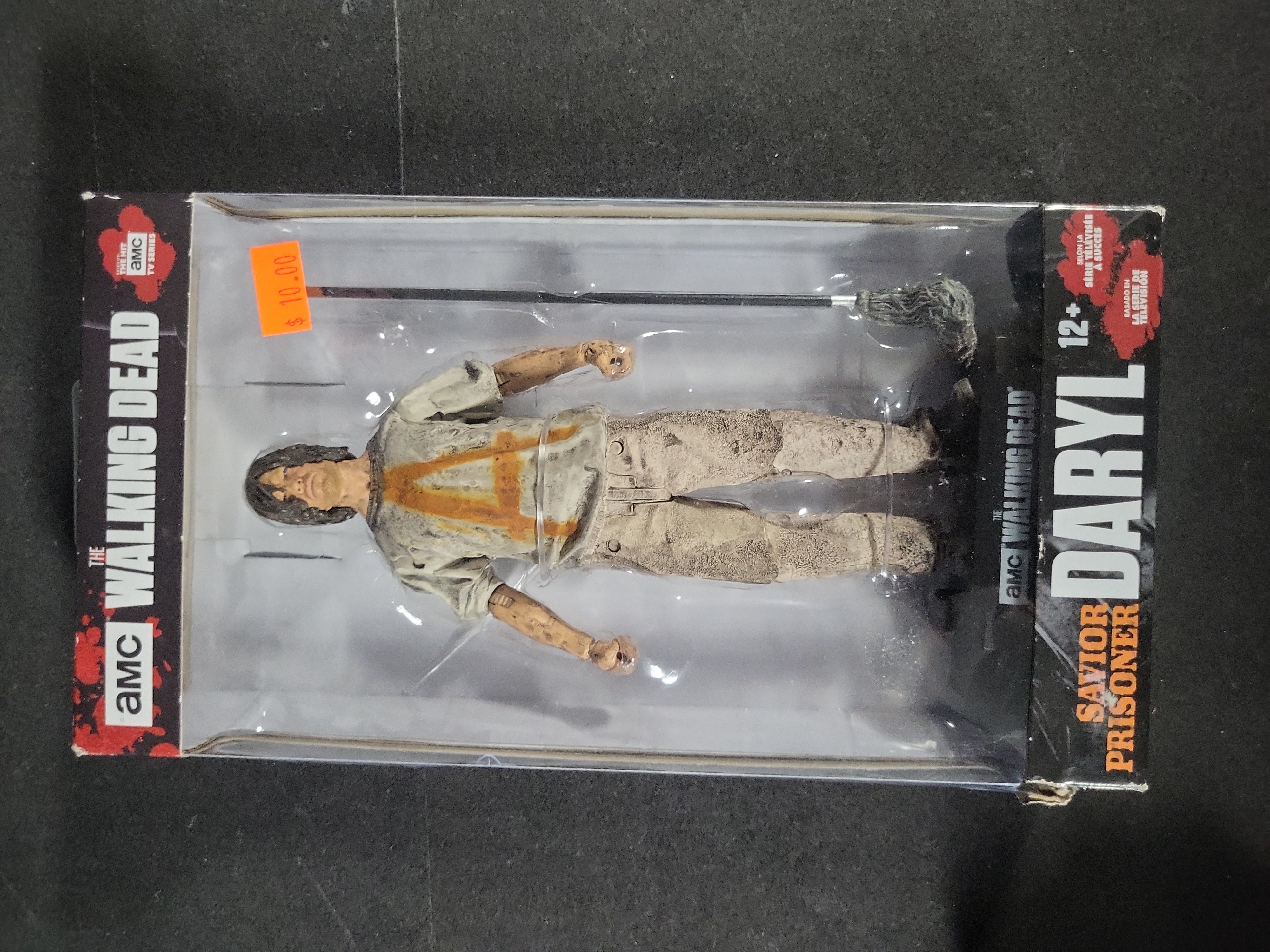 I03529 | Five The Walking Dead Collectible Items Including McFarlane Toys Action Figures and Cryptozoic Trading Cards