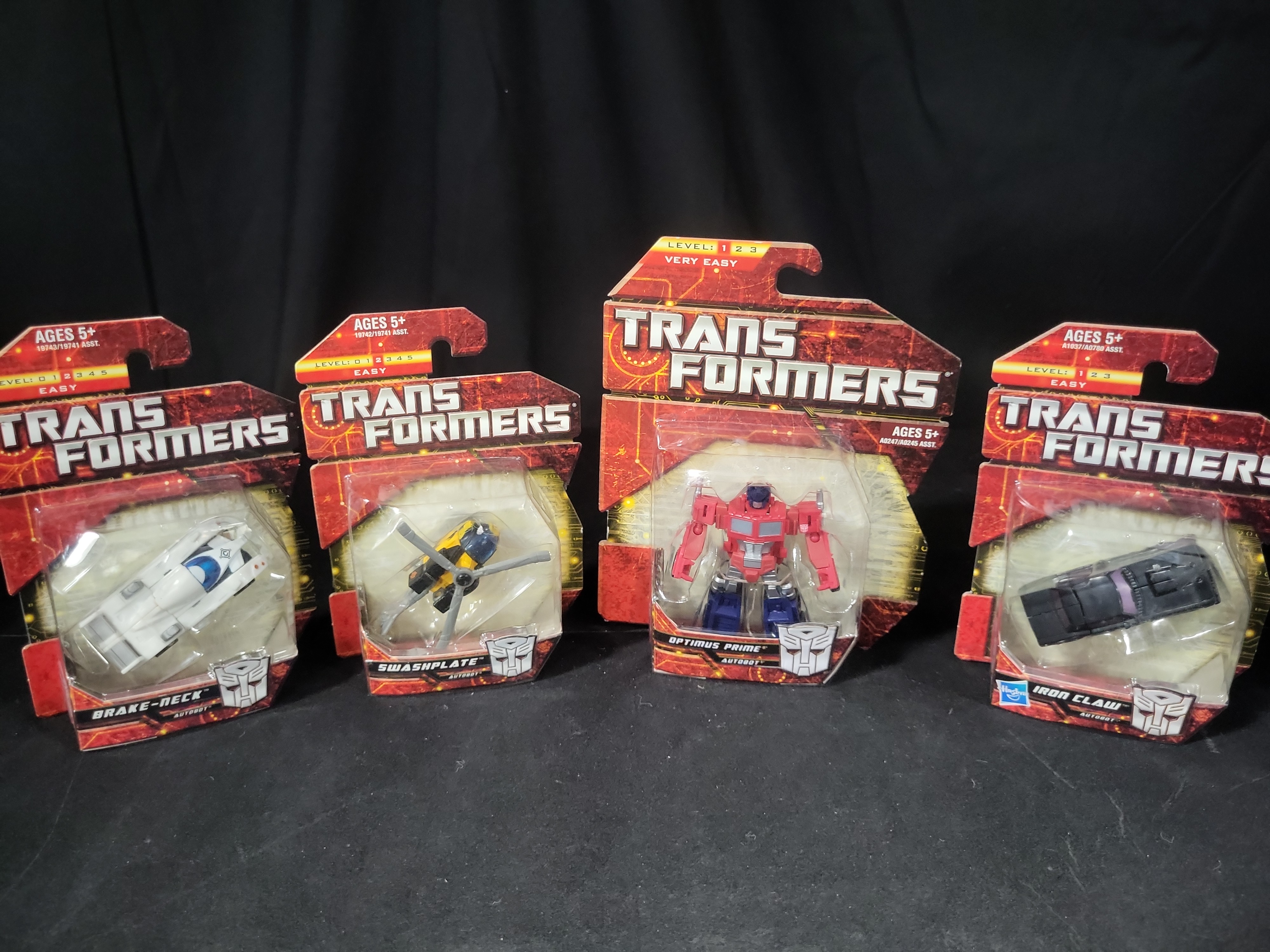 I03541 | Four Hasbro Transformers Legion Class Action Figures Factory Sealed