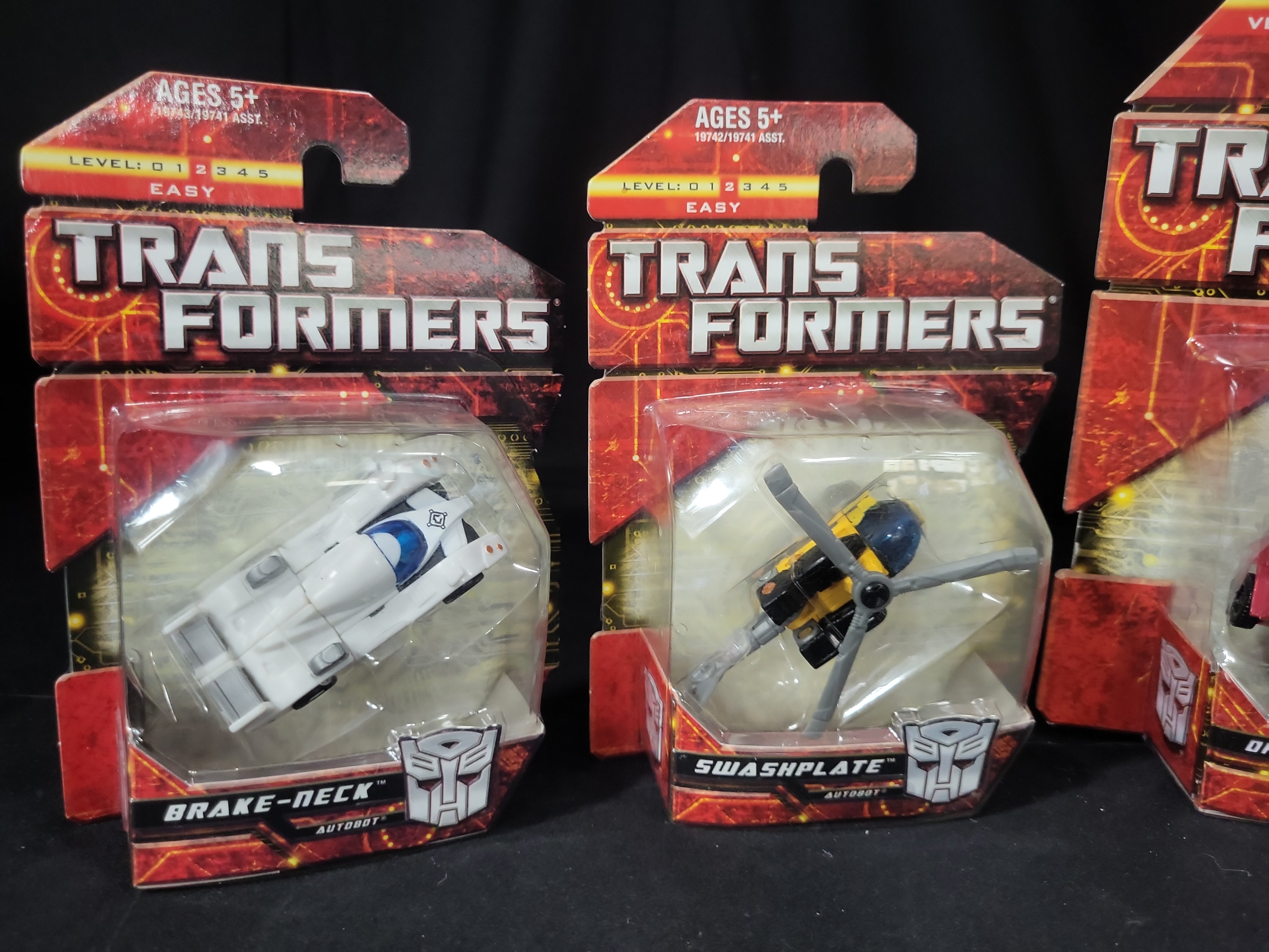 I03541 | Four Hasbro Transformers Legion Class Action Figures Factory Sealed