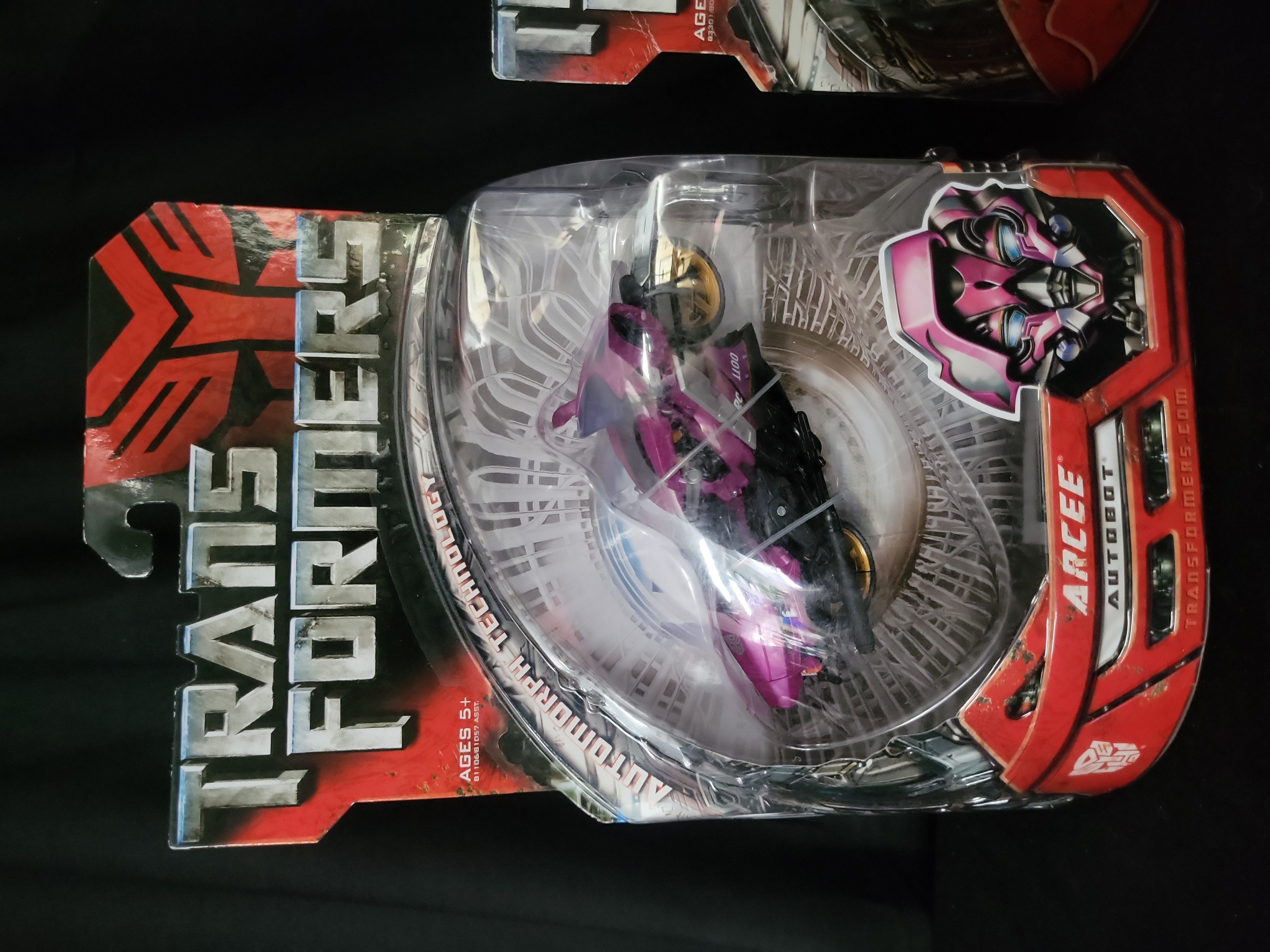 I03544 | A Pair of Transformers 2007 Movie Action Figures, Arcee and Target Exclusive Armorhide