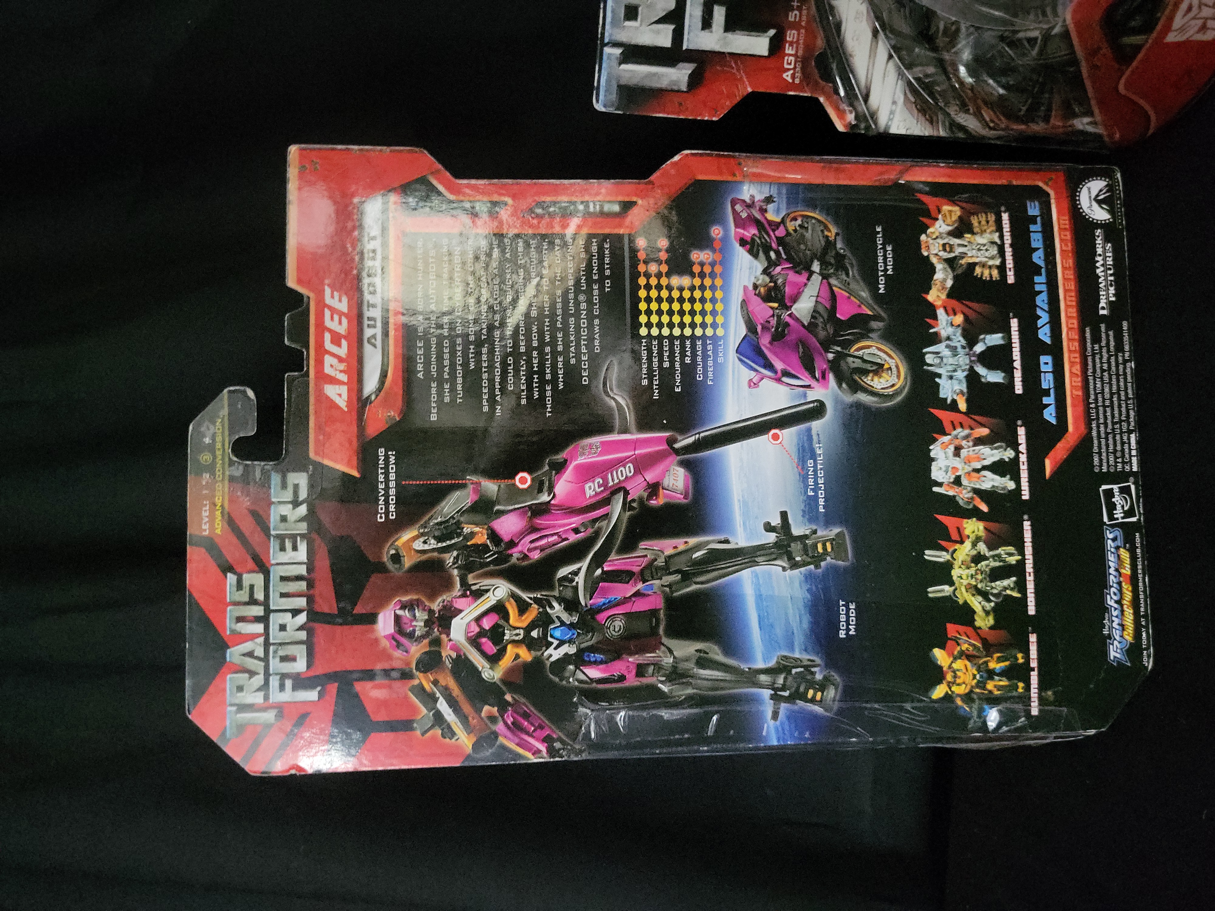 I03544 | A Pair of Transformers 2007 Movie Action Figures, Arcee and Target Exclusive Armorhide