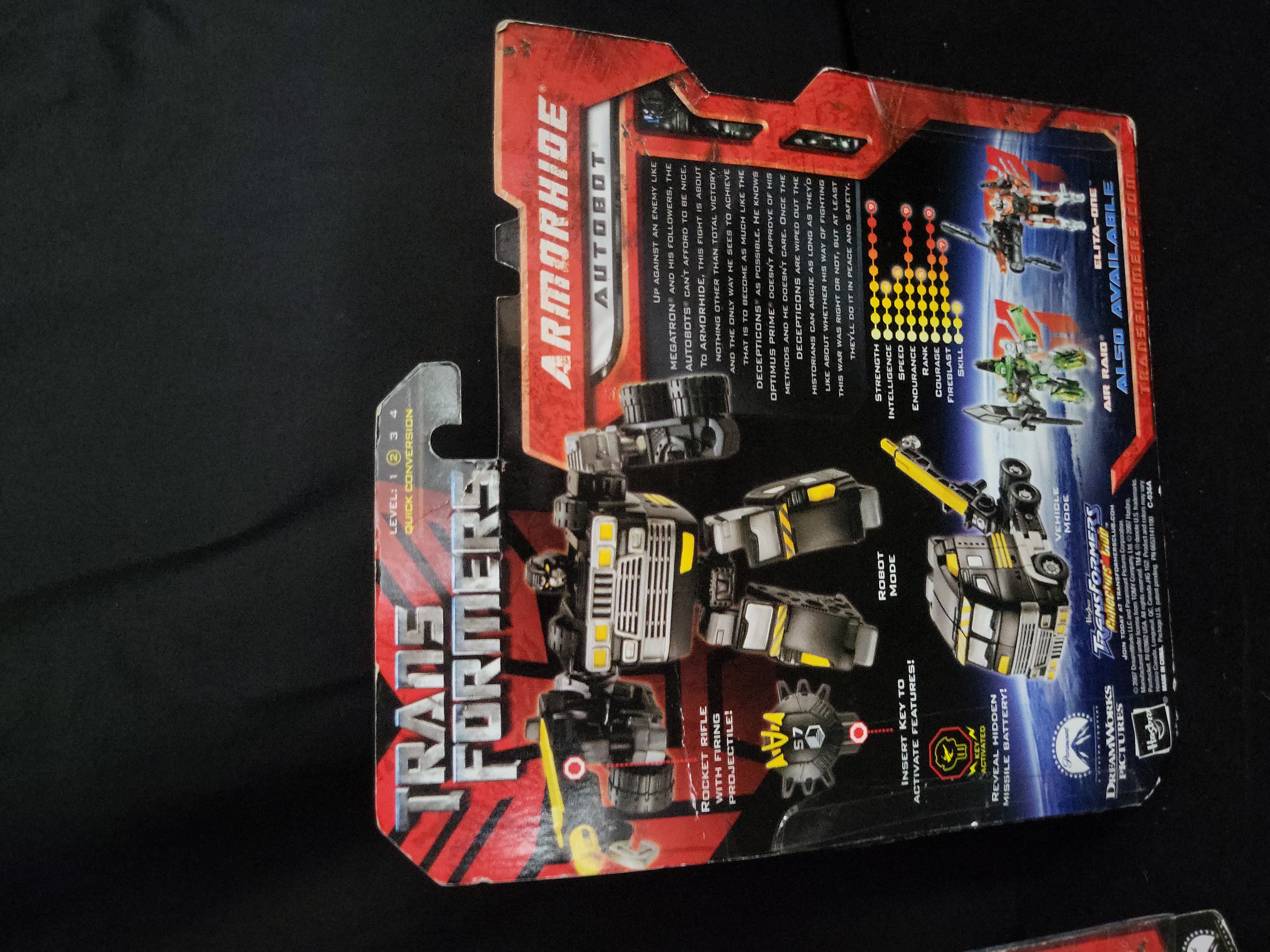 I03544 | A Pair of Transformers 2007 Movie Action Figures, Arcee and Target Exclusive Armorhide