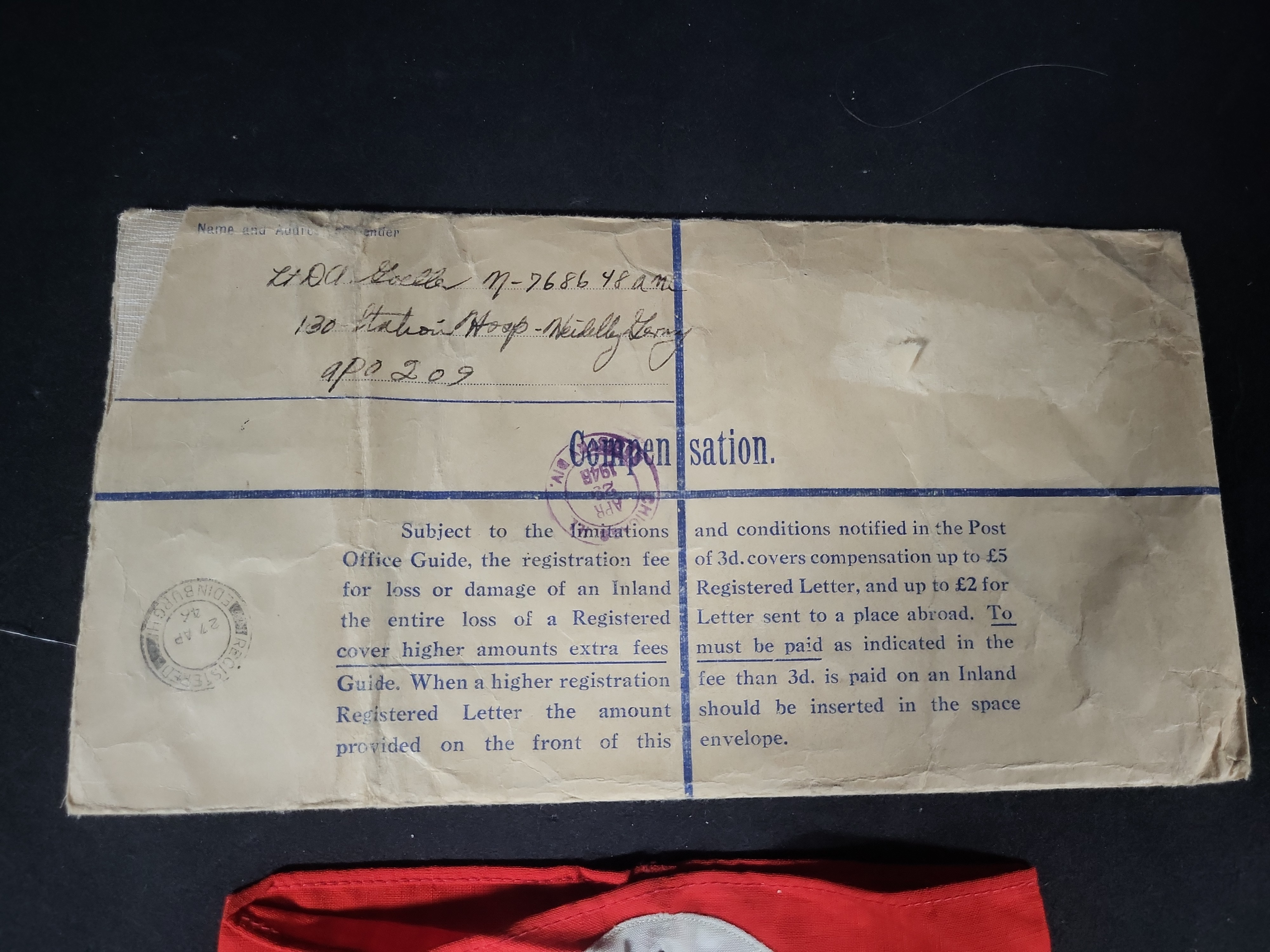 I03194 | Two WWII Items Including a German NSDAP Armband and Registered Shipping Envelope