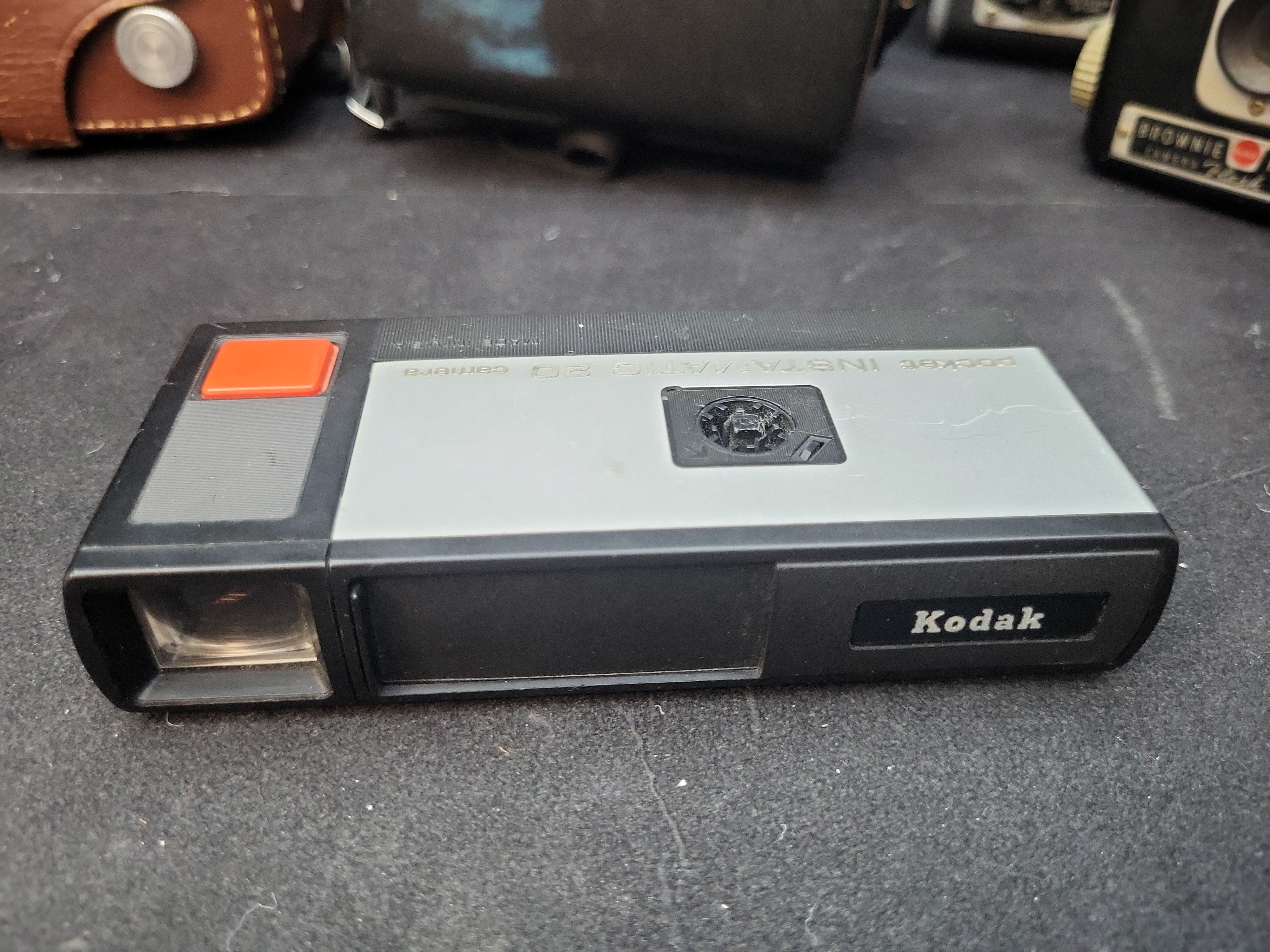 I03636 | A Collection of Eight Vintage Kodak Cameras Including Duaflex, Instamatic, and Brownie Models