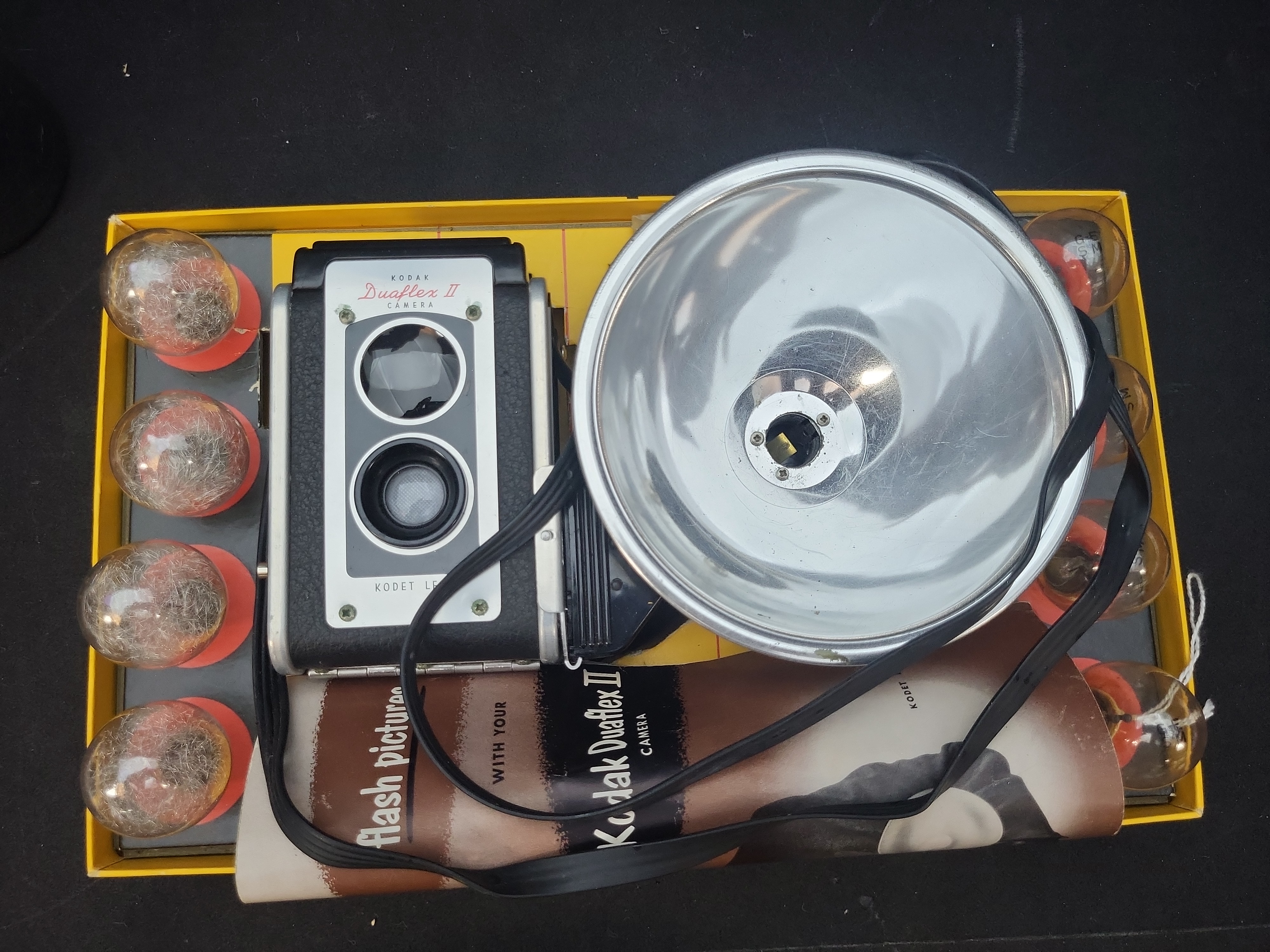 I03638 | Two Vintage Photographic Items Including a Kodak Duaflex II Flash Outfit and Pentax Zoom Lens