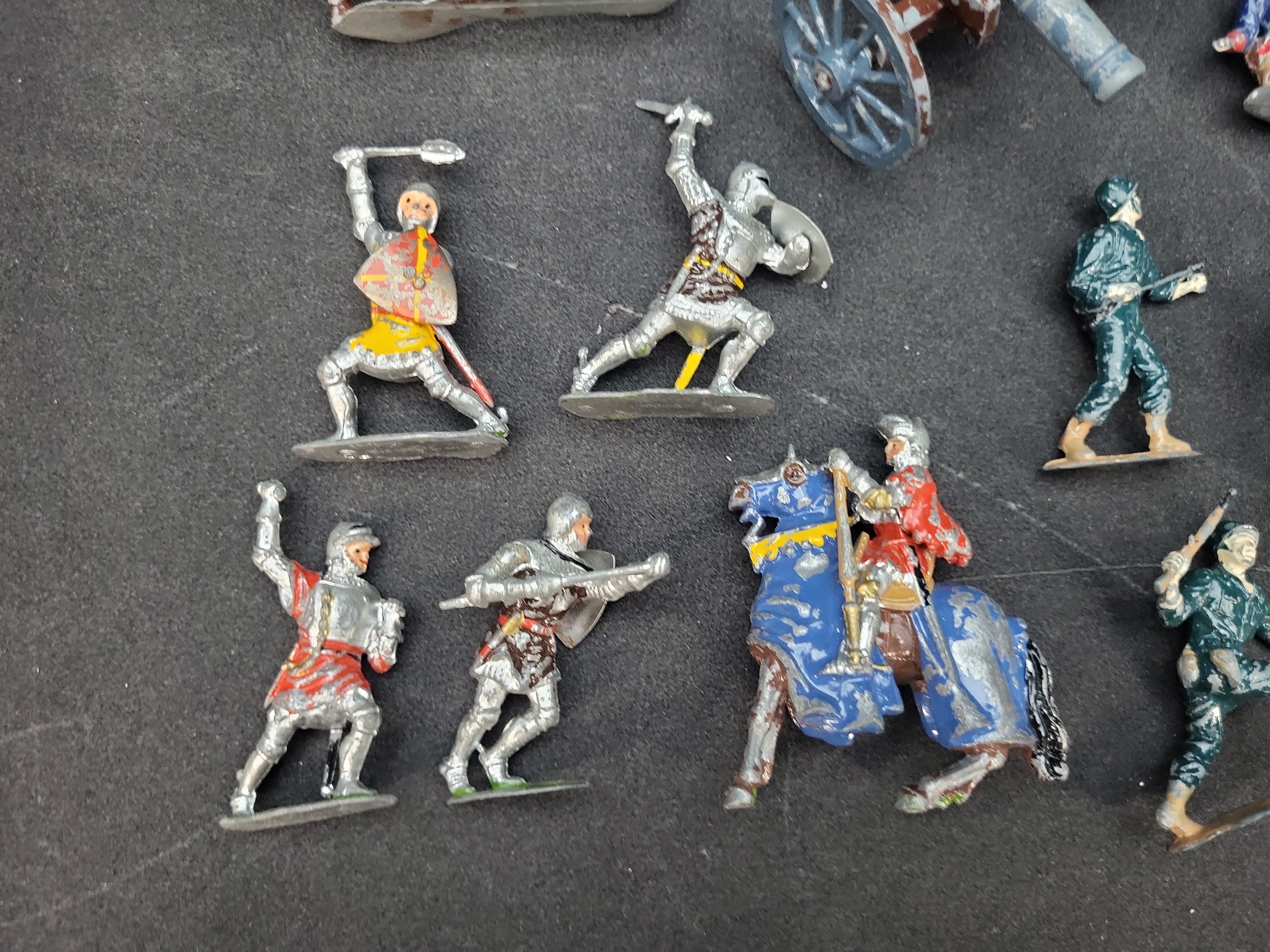 I03933 | A Collection of Twenty-One Vintage Toy Soldiers and Military Accessories