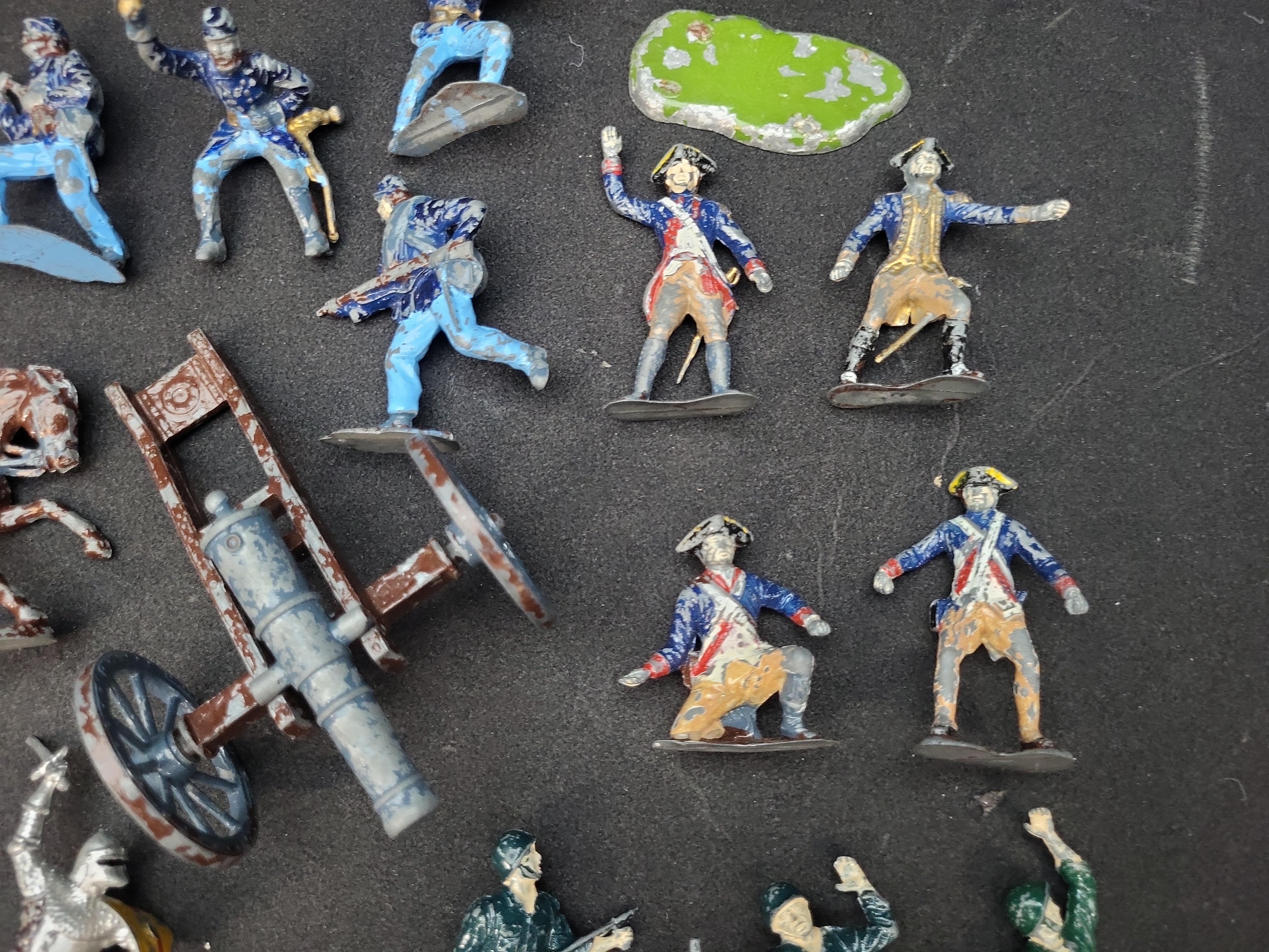 I03933 | A Collection of Twenty-One Vintage Toy Soldiers and Military Accessories