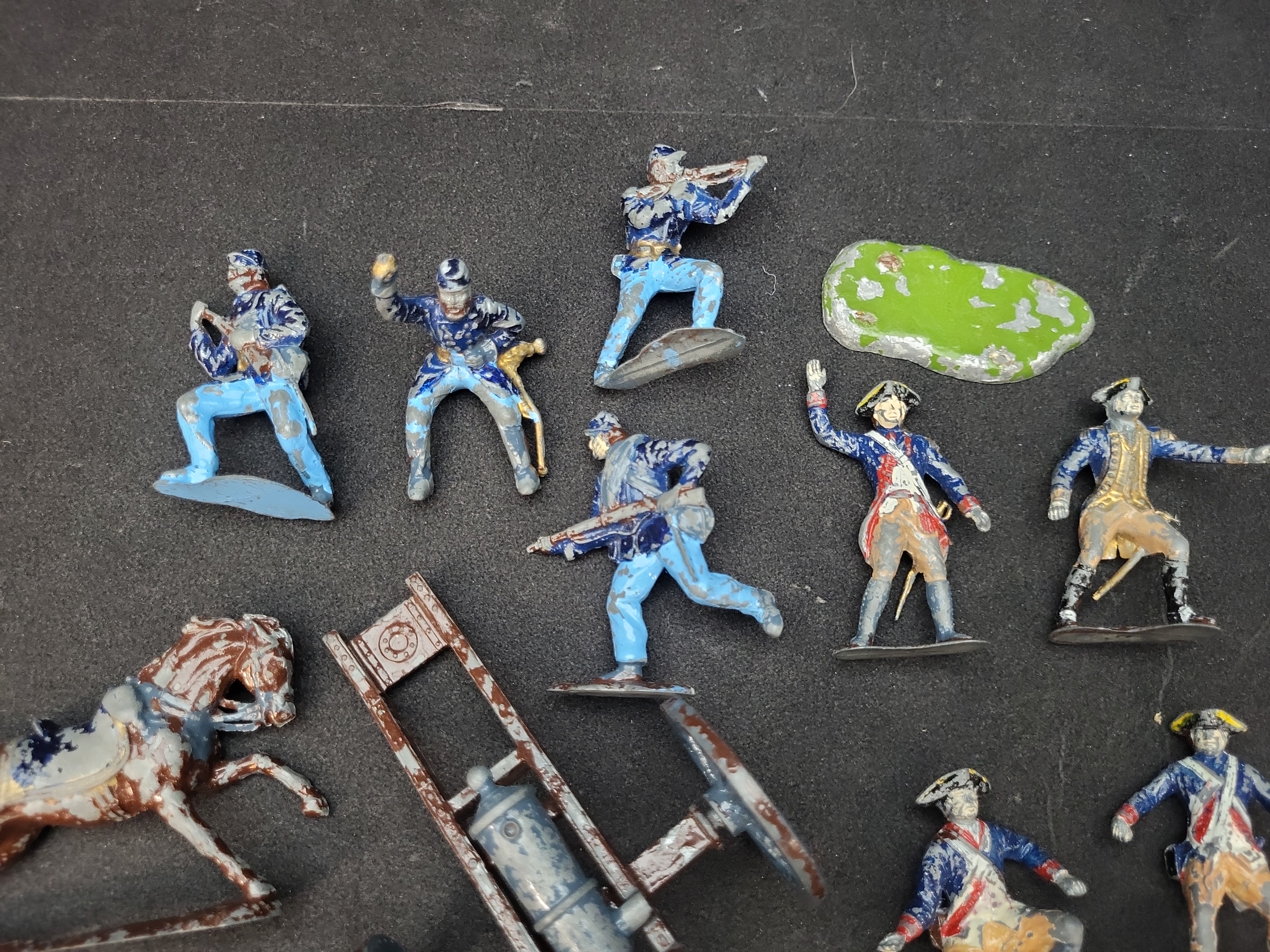I03933 | A Collection of Twenty-One Vintage Toy Soldiers and Military Accessories