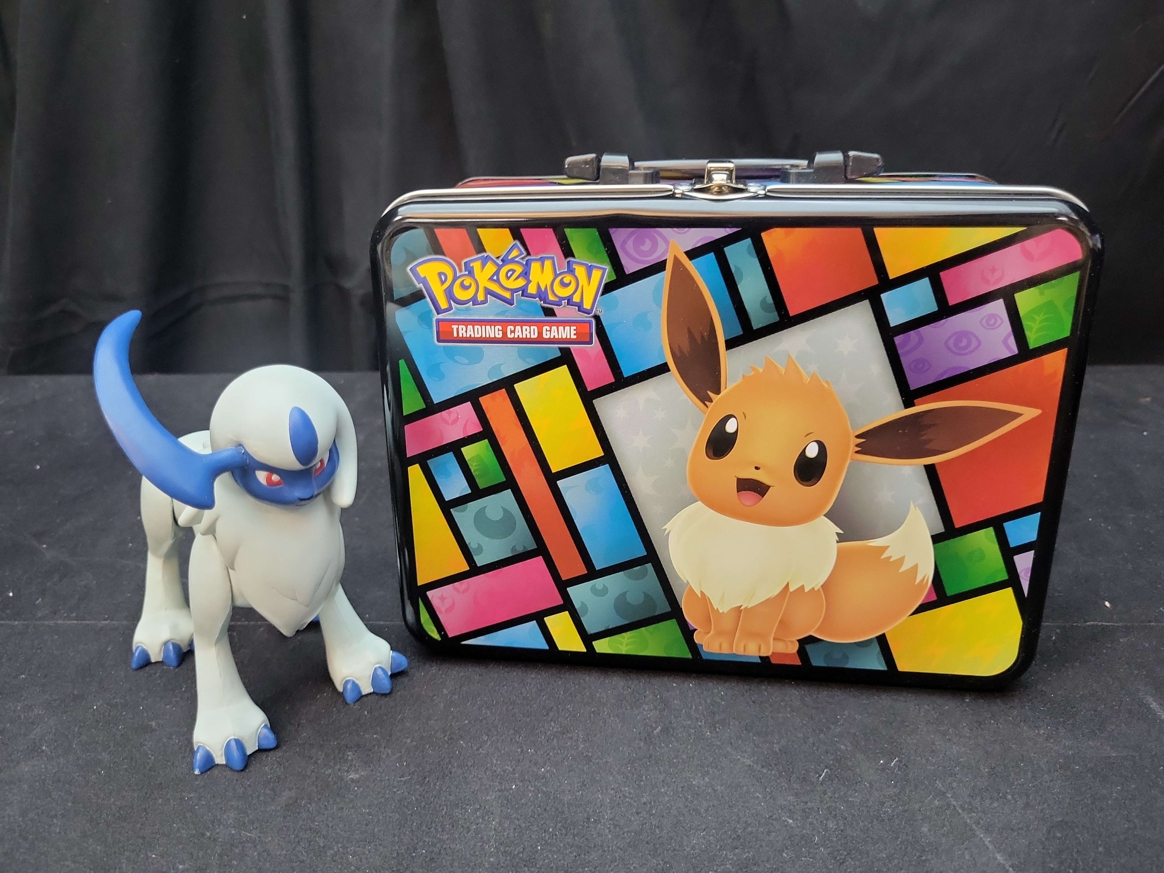 I02921 | A Collection of Pokemon TCG Collector Chest, Action Figures, and Gameplay Coins