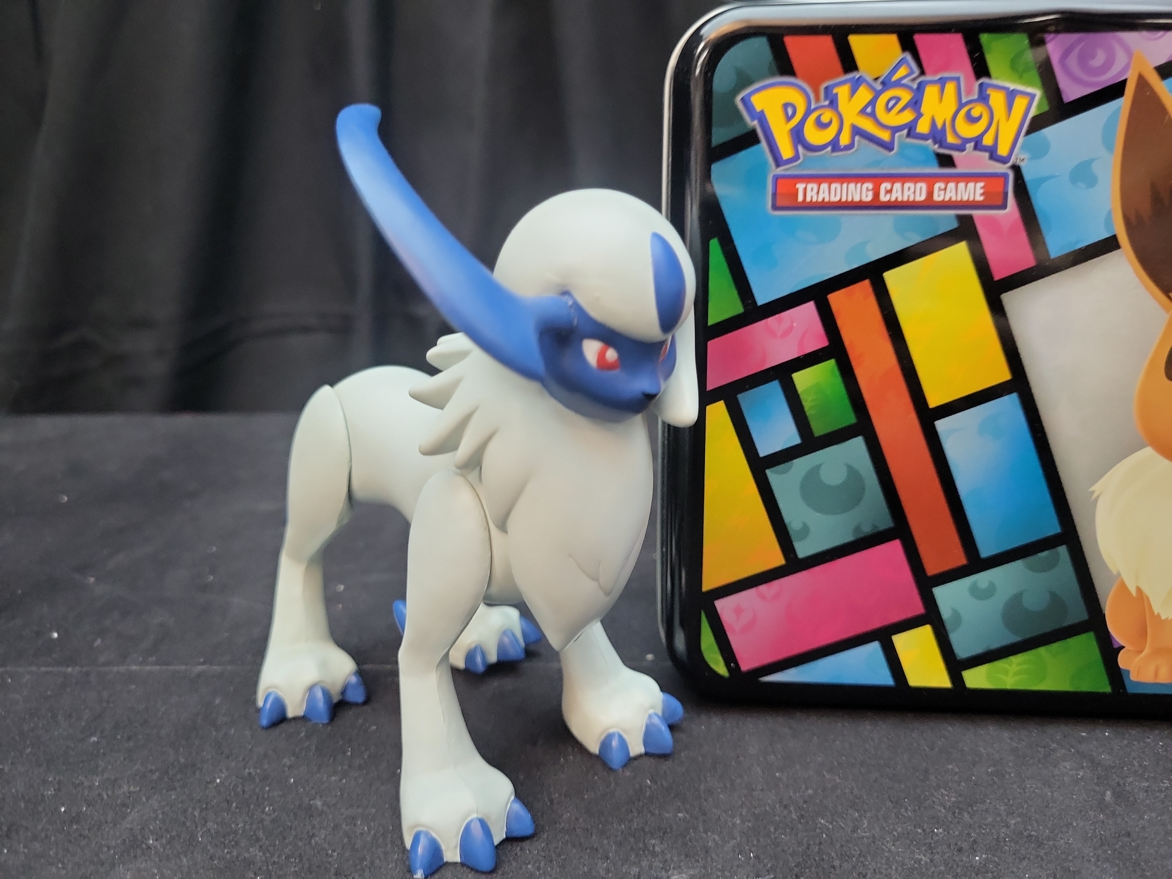 I02921 | A Collection of Pokemon TCG Collector Chest, Action Figures, and Gameplay Coins