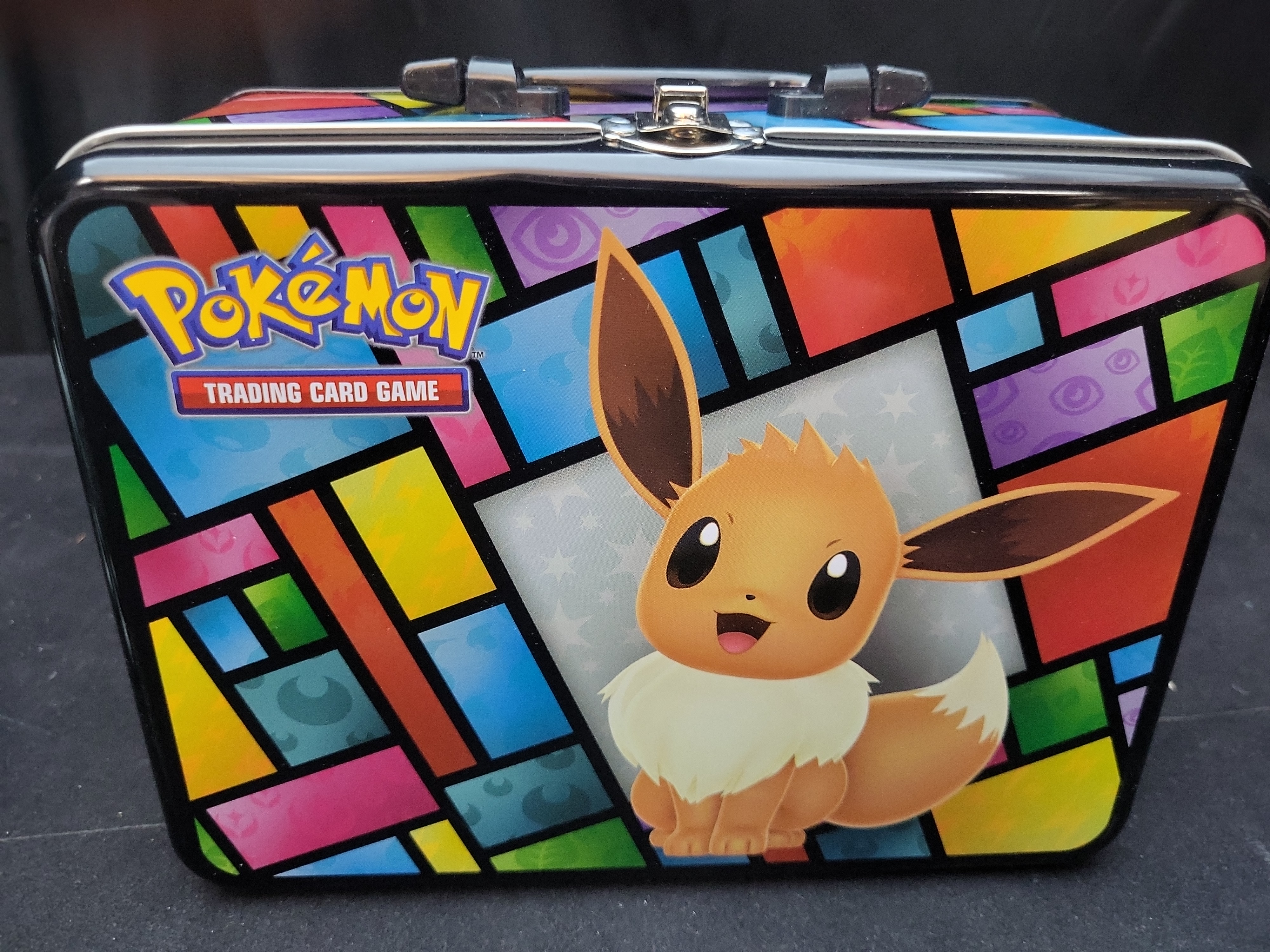 I02921 | A Collection of Pokemon TCG Collector Chest, Action Figures, and Gameplay Coins