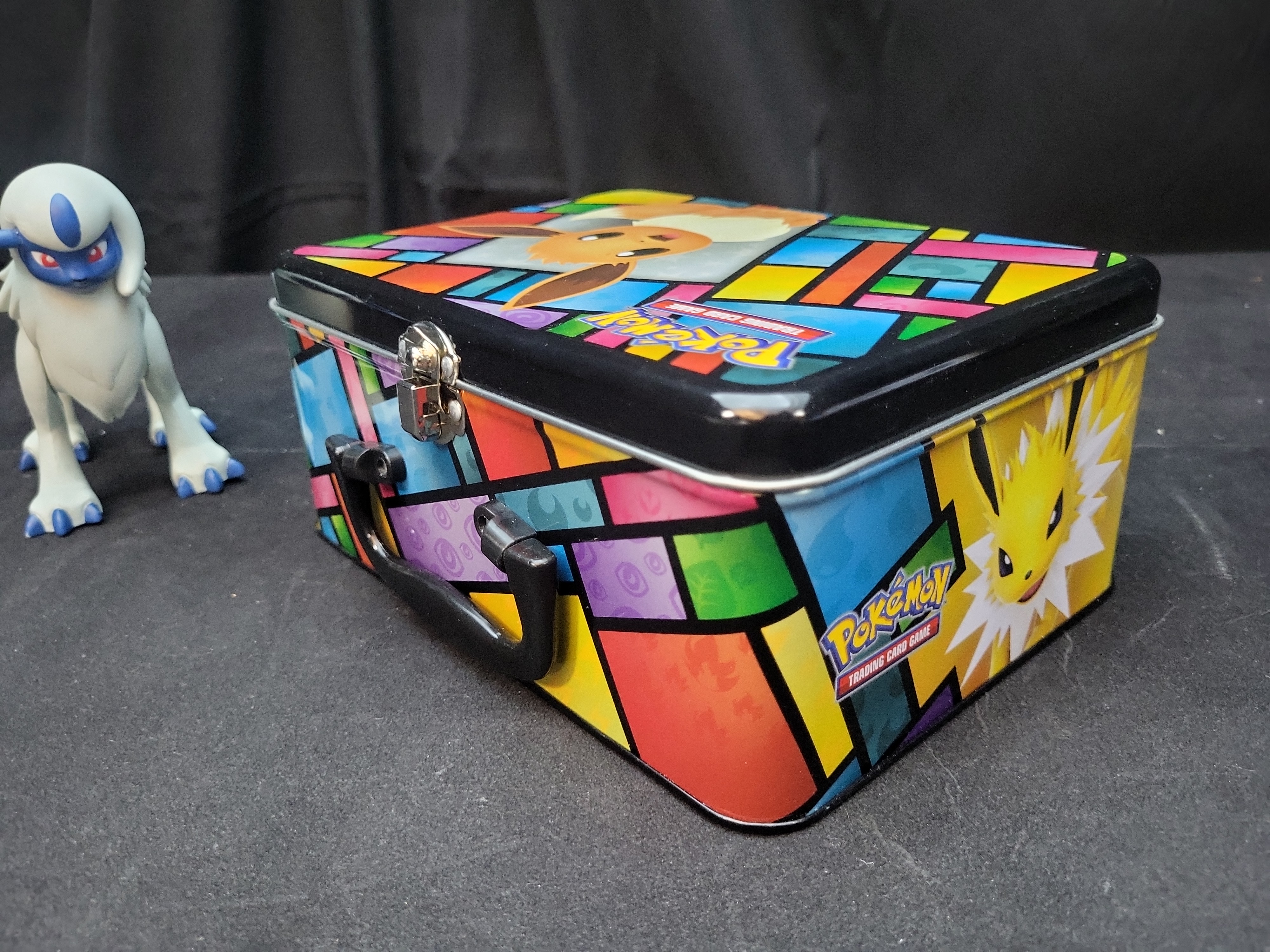 I02921 | A Collection of Pokemon TCG Collector Chest, Action Figures, and Gameplay Coins