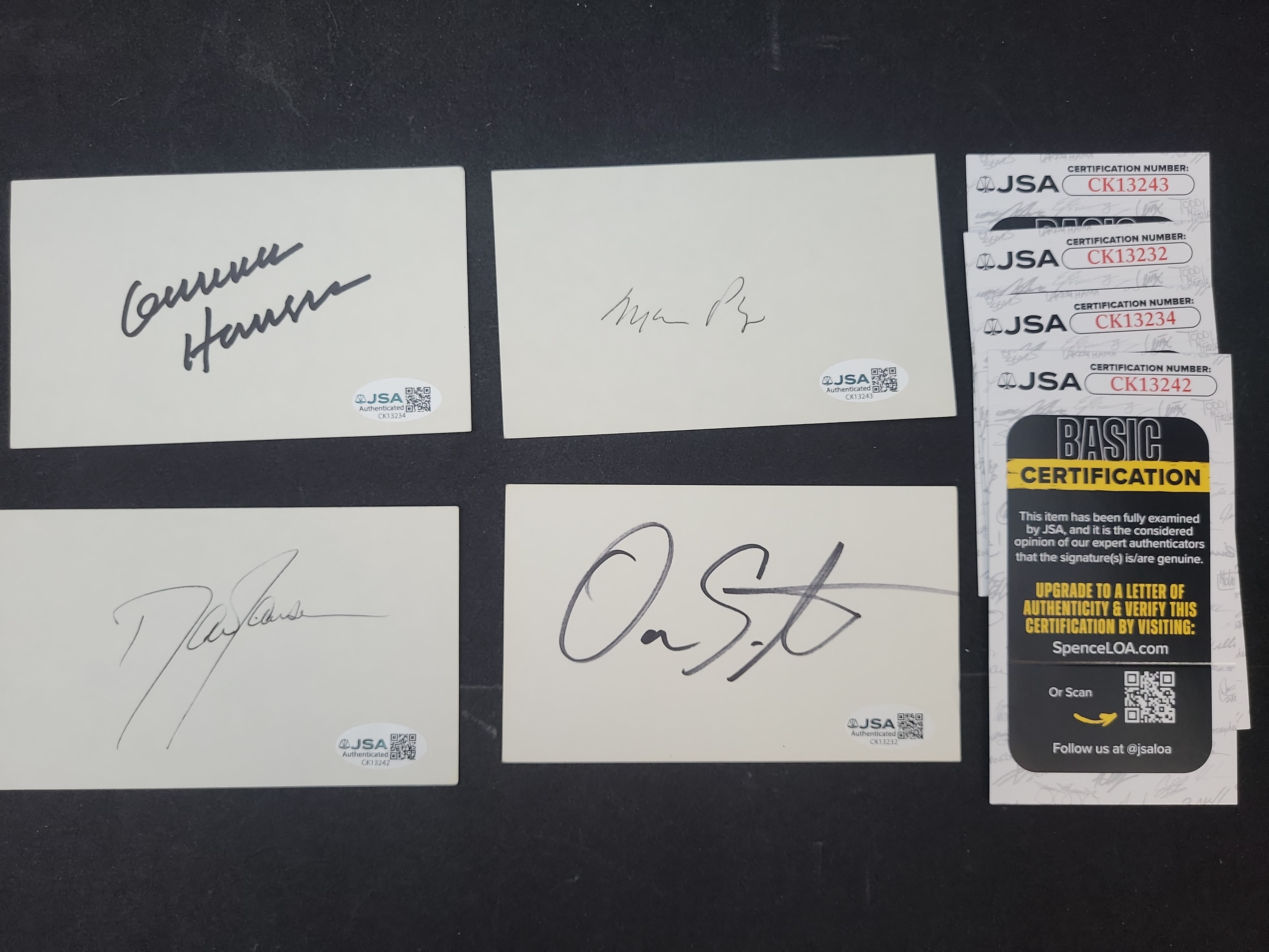 I03370 | Four JSA Authenticated Autographed Index Cards including Mario Puzo and Gunnar Hansen