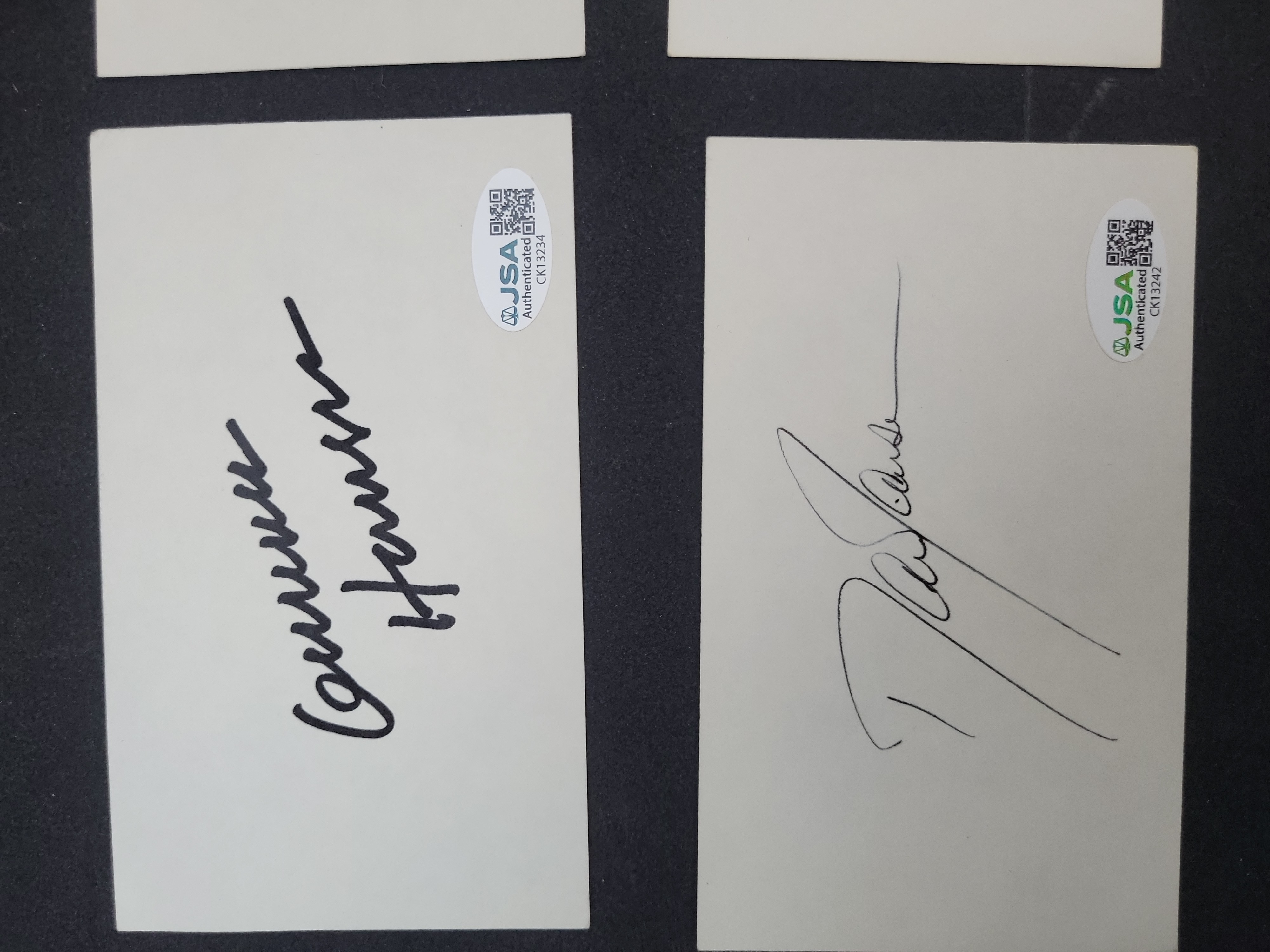 I03370 | Four JSA Authenticated Autographed Index Cards including Mario Puzo and Gunnar Hansen