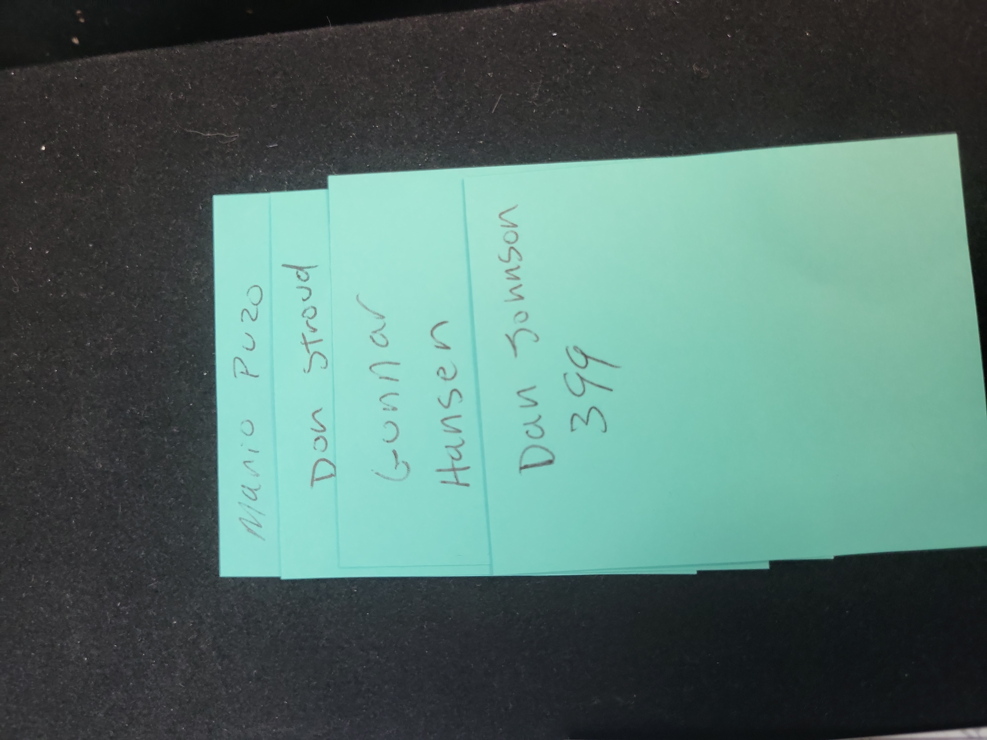 I03370 | Four JSA Authenticated Autographed Index Cards including Mario Puzo and Gunnar Hansen